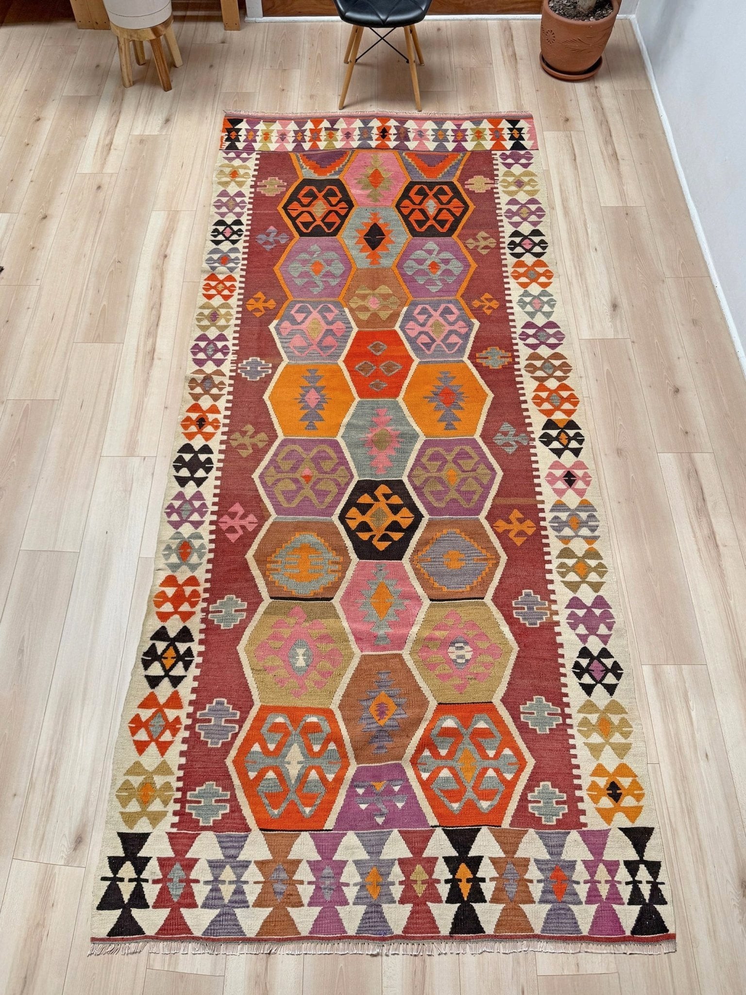 Handmade vintage Turkish kilim rug from 1960s, 5x12 runner with tribal motifs and vibrant colors like terracotta, magenta, ochre, and violet; perfect for entry, hallway, living room, bedroom, kitchen, or dining. Best for boho or modern decor. From the best rug shop San Mateo SF Bay Area with free shipping.