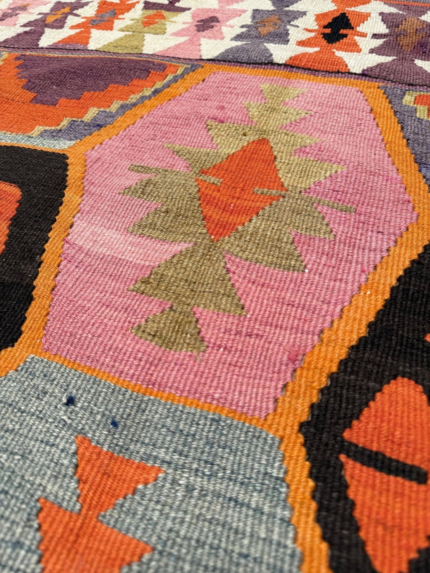 Handmade vintage Turkish kilim rug from 1960s, 5x12 runner with tribal motifs and vibrant colors like terracotta, magenta, ochre, and violet; perfect for entry, hallway, living room, bedroom, kitchen, or dining. Best for boho or modern decor. From the best rug shop San Mateo SF Bay Area with free shipping.