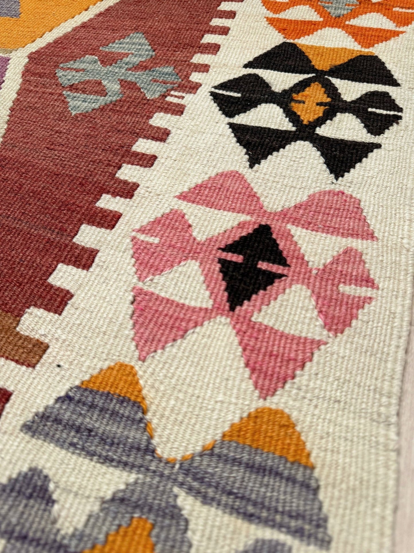 Handmade vintage Turkish kilim rug from 1960s, 5x12 runner with tribal motifs and vibrant colors like terracotta, magenta, ochre, and violet; perfect for entry, hallway, living room, bedroom, kitchen, or dining. Best for boho or modern decor. From the best rug shop San Mateo SF Bay Area with free shipping.