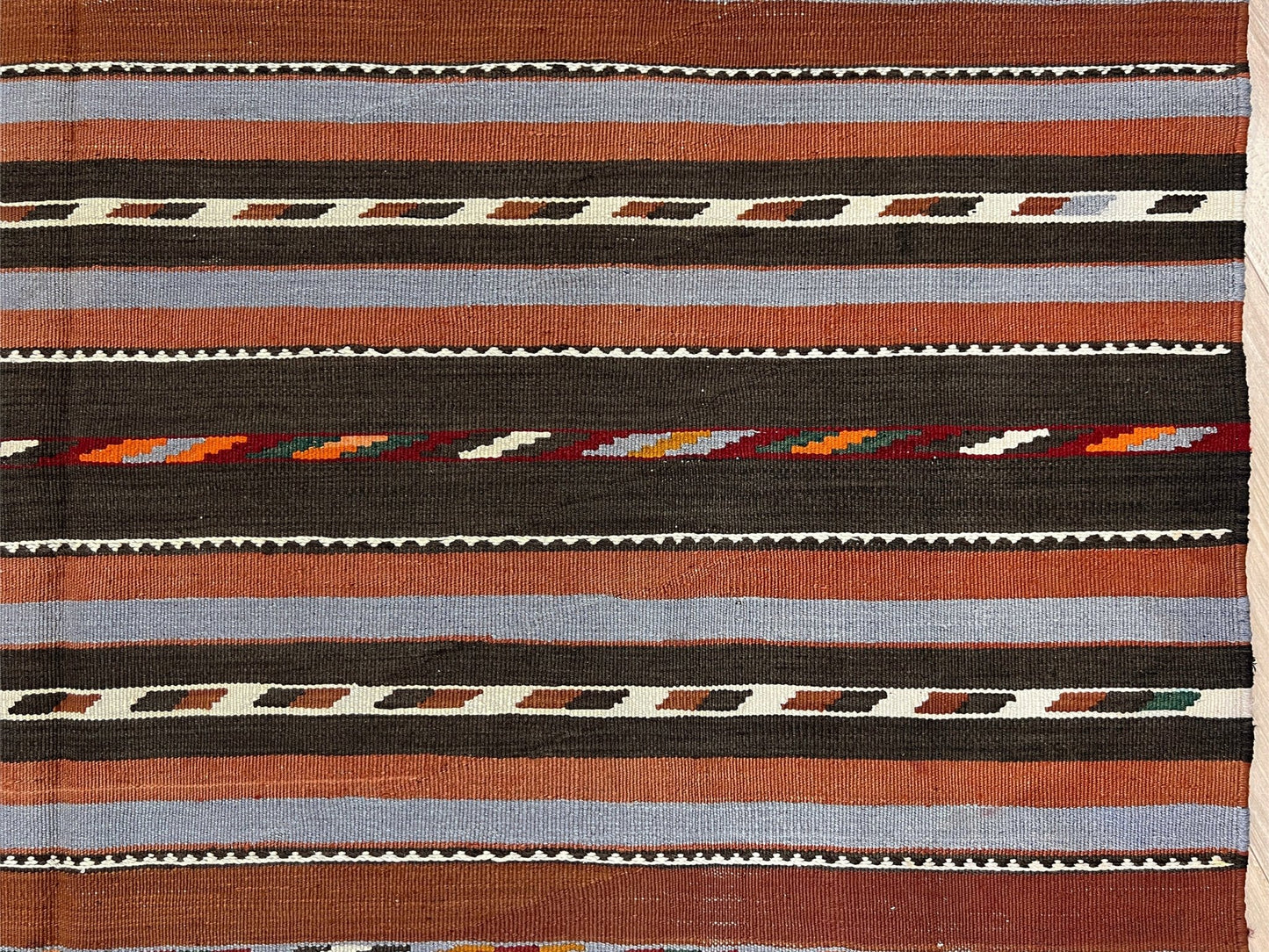 Vintage Caucasian kilim rug with horizontal tribal stripes in rust, brown, gray, and ivory tones, handwoven wool flatweave rug 6x9