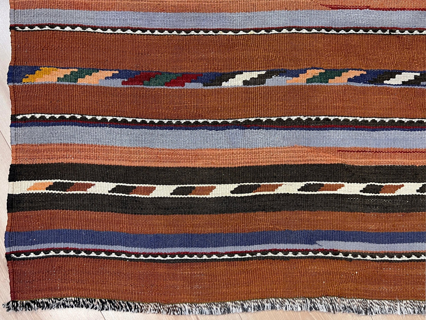 Vintage Caucasian kilim rug with horizontal tribal stripes in rust, brown, gray, and ivory tones, handwoven wool flatweave rug 6x9