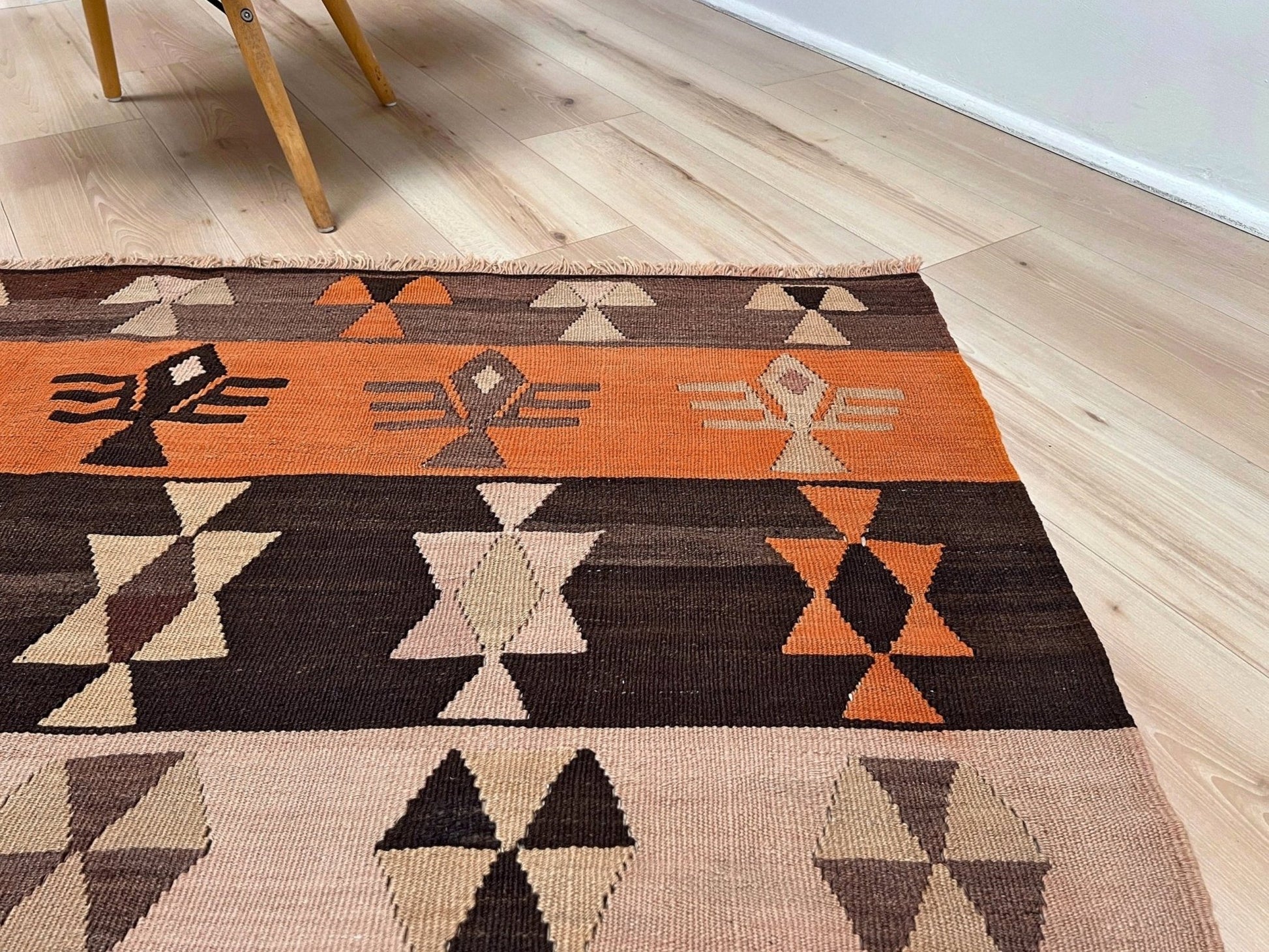 Earthy Vintage Central Anatolian Turkish kilim rug, 6x8 with horizontal tribal bands and geometric motifs. 