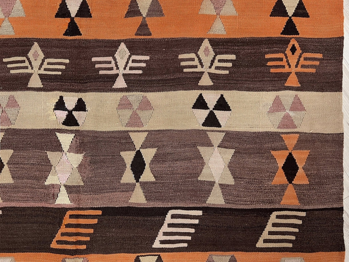 Earthy Vintage Central Anatolian Turkish kilim rug, 6x8 with horizontal tribal bands and geometric motifs. 