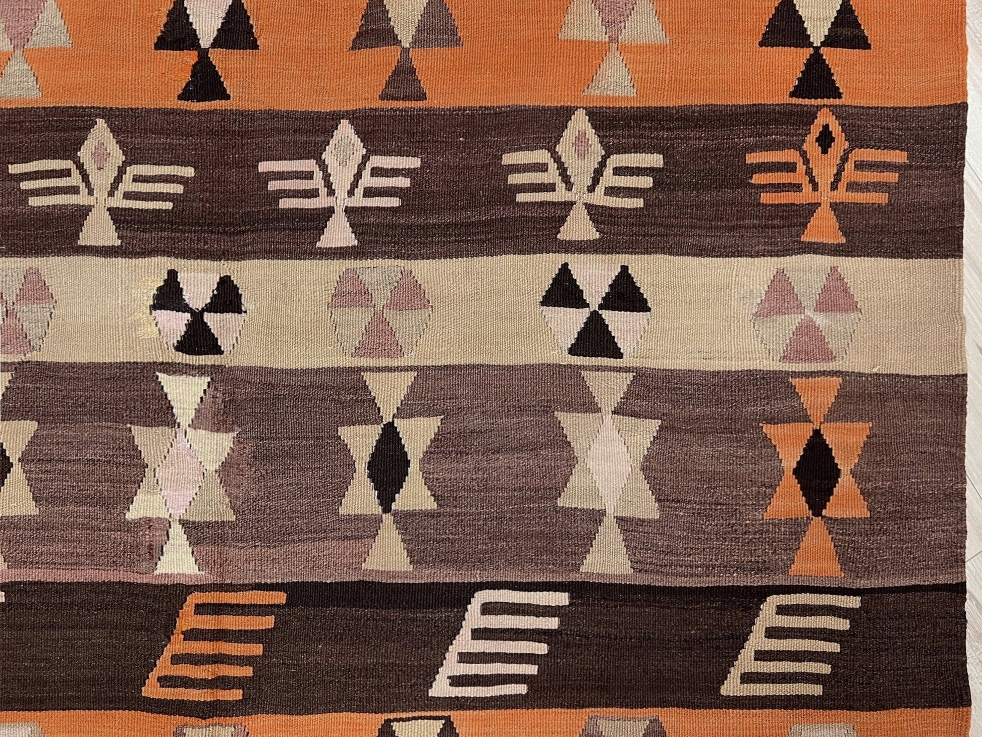 Earthy Vintage Central Anatolian Turkish kilim rug, 6x8 with horizontal tribal bands and geometric motifs. 