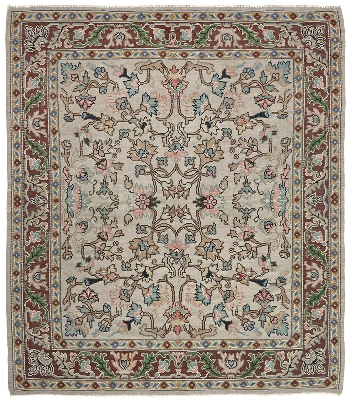 Handmade square 8x9 vintage Balkan floral kilim flatweave rug with light parchment field and vine-and-blossom design in dusty blue, rose, and sage tones.