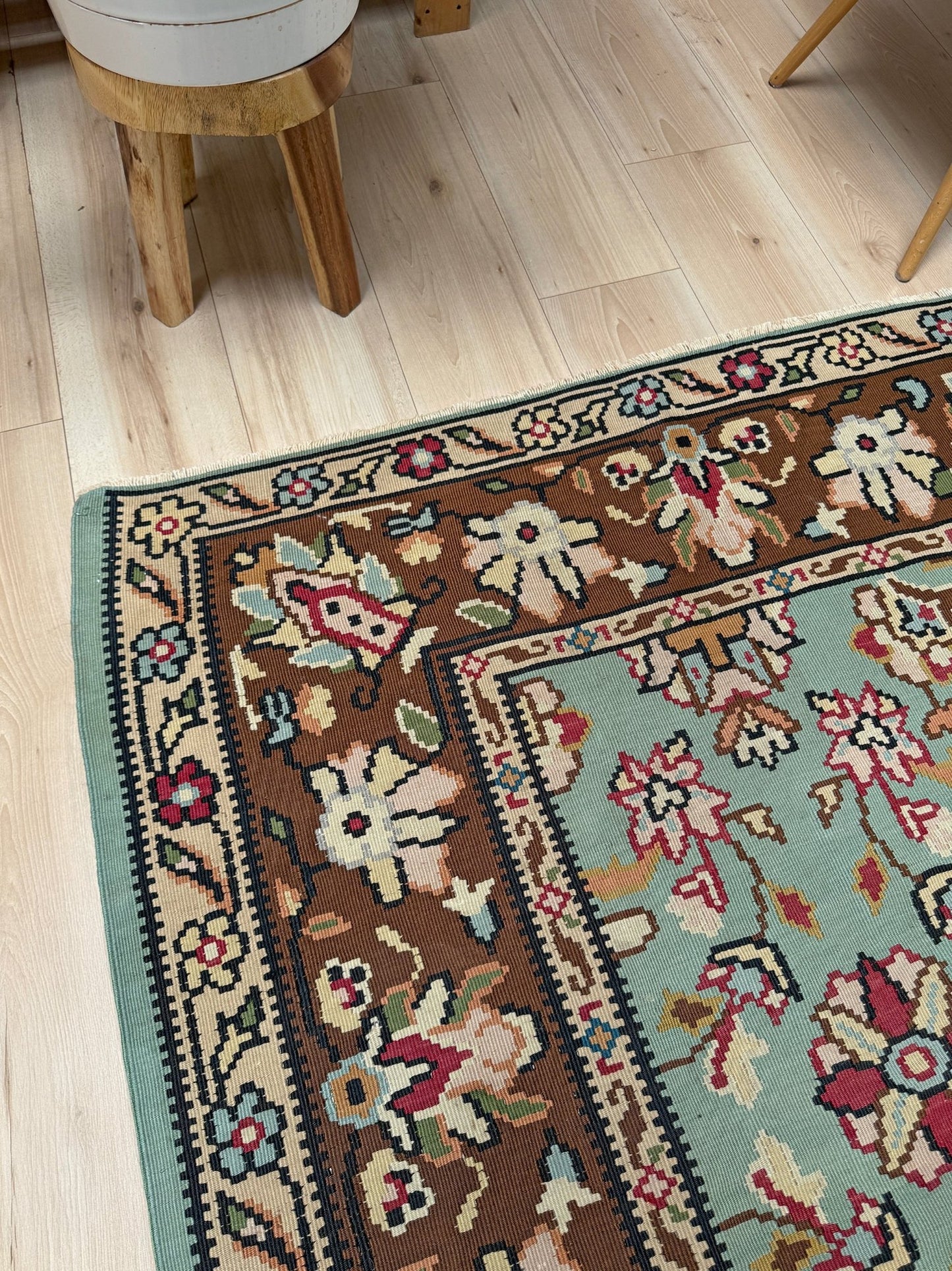 Handmade vintage European kilim rug 8x11 with floral design in robin’s egg blue, chestnut, ivory, and magenta tones; perfect for dining room, living room, bedroom, or kitchen; ideal for boho or floral decor; available at the best rug shop in San Mateo, SF Bay Area with free shipping.