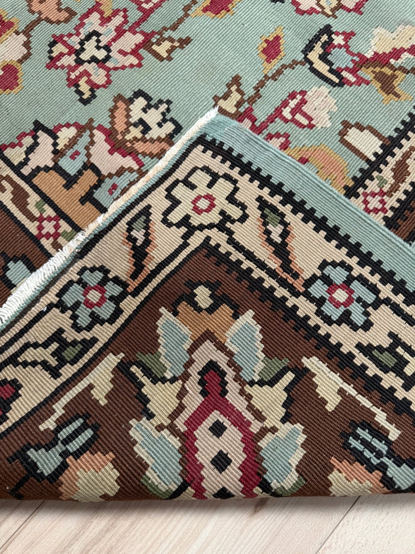 Handmade vintage European kilim rug 8x11 with floral design in robin’s egg blue, chestnut, ivory, and magenta tones; perfect for dining room, living room, bedroom, or kitchen; ideal for boho or floral decor; available at the best rug shop in San Mateo, SF Bay Area with free shipping.