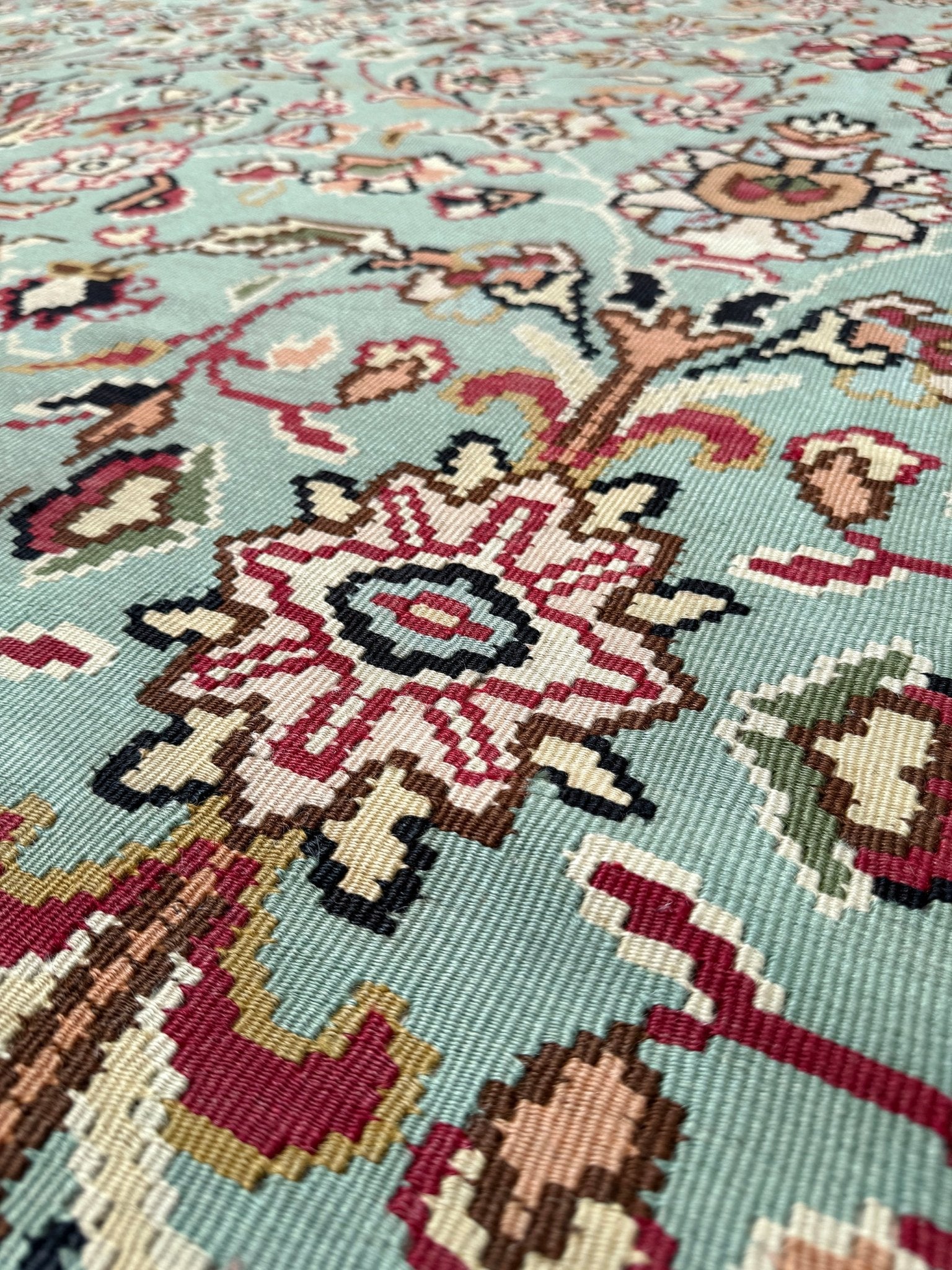 Handmade vintage European kilim rug 8x11 with floral design in robin’s egg blue, chestnut, ivory, and magenta tones; perfect for dining room, living room, bedroom, or kitchen; ideal for boho or floral decor; available at the best rug shop in San Mateo, SF Bay Area with free shipping.