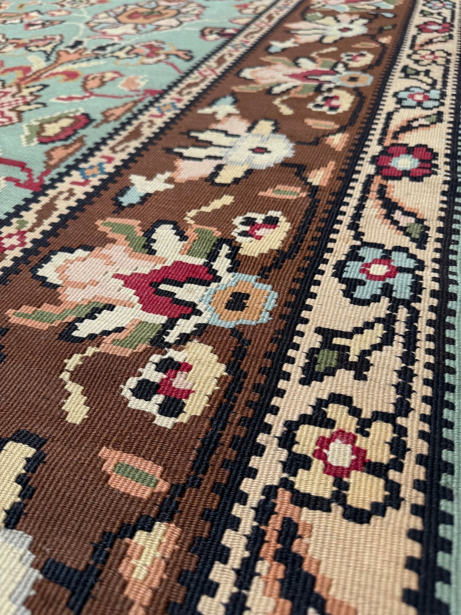 Handmade vintage European kilim rug 8x11 with floral design in robin’s egg blue, chestnut, ivory, and magenta tones; perfect for dining room, living room, bedroom, or kitchen; ideal for boho or floral decor; available at the best rug shop in San Mateo, SF Bay Area with free shipping.