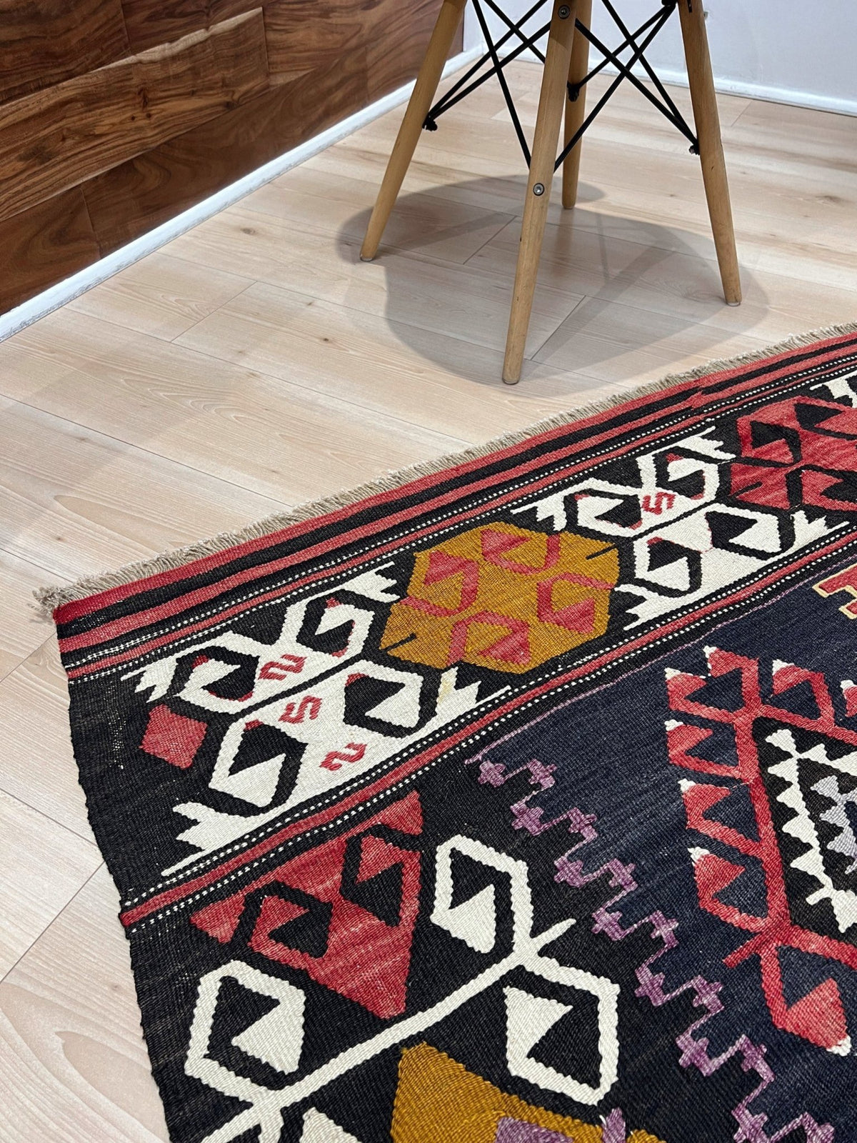 6x8 Vintage Karakecili Turkish kilim rug with bold tribal geometric motifs in charcoal, coral red, ivory, mustard, and soft gray, handwoven flatweave from the 1950s. 