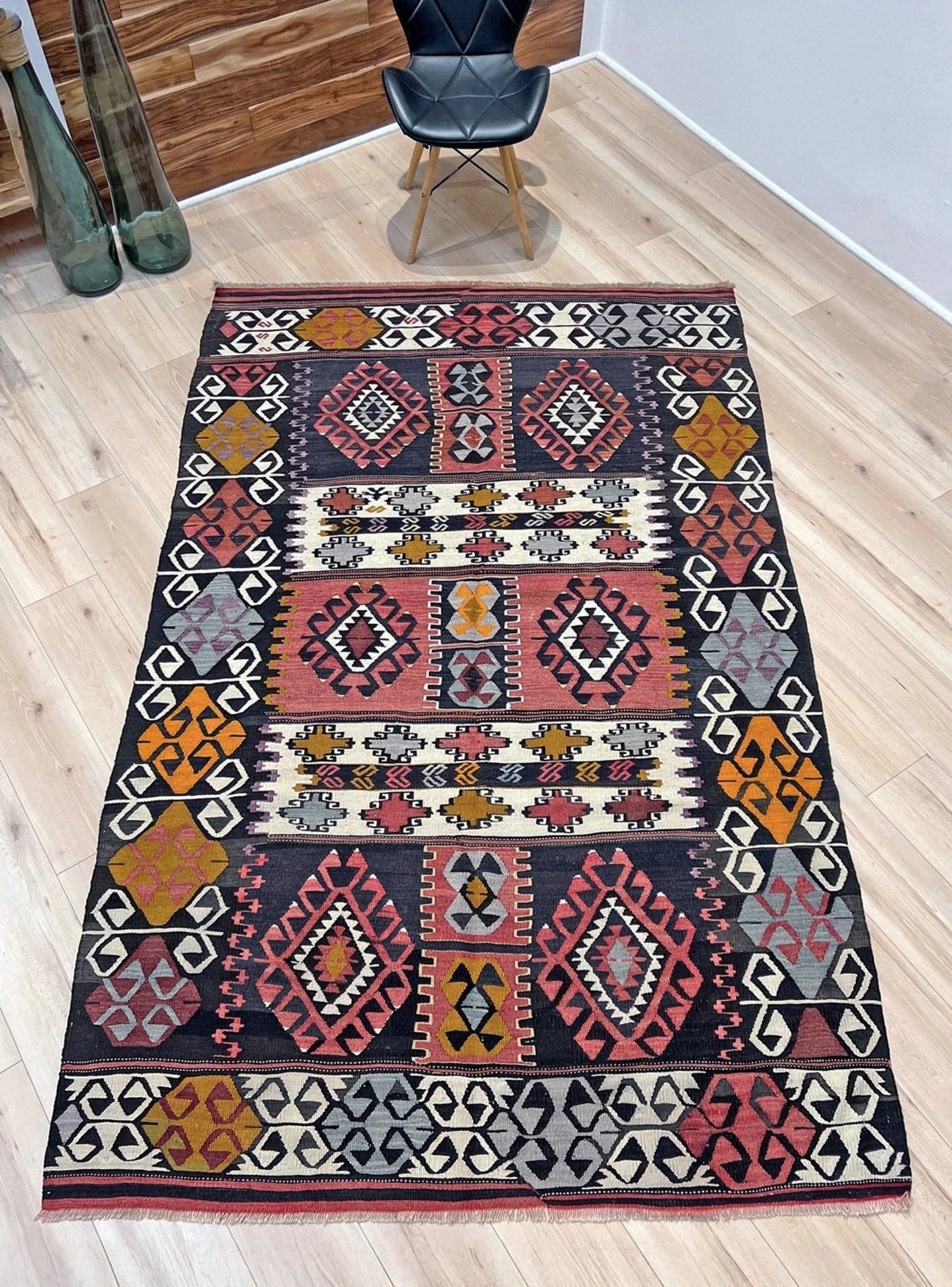 6x8 Vintage Karakecili Turkish kilim rug with bold tribal geometric motifs in charcoal, coral red, ivory, mustard, and soft gray, handwoven flatweave from the 1950s. 