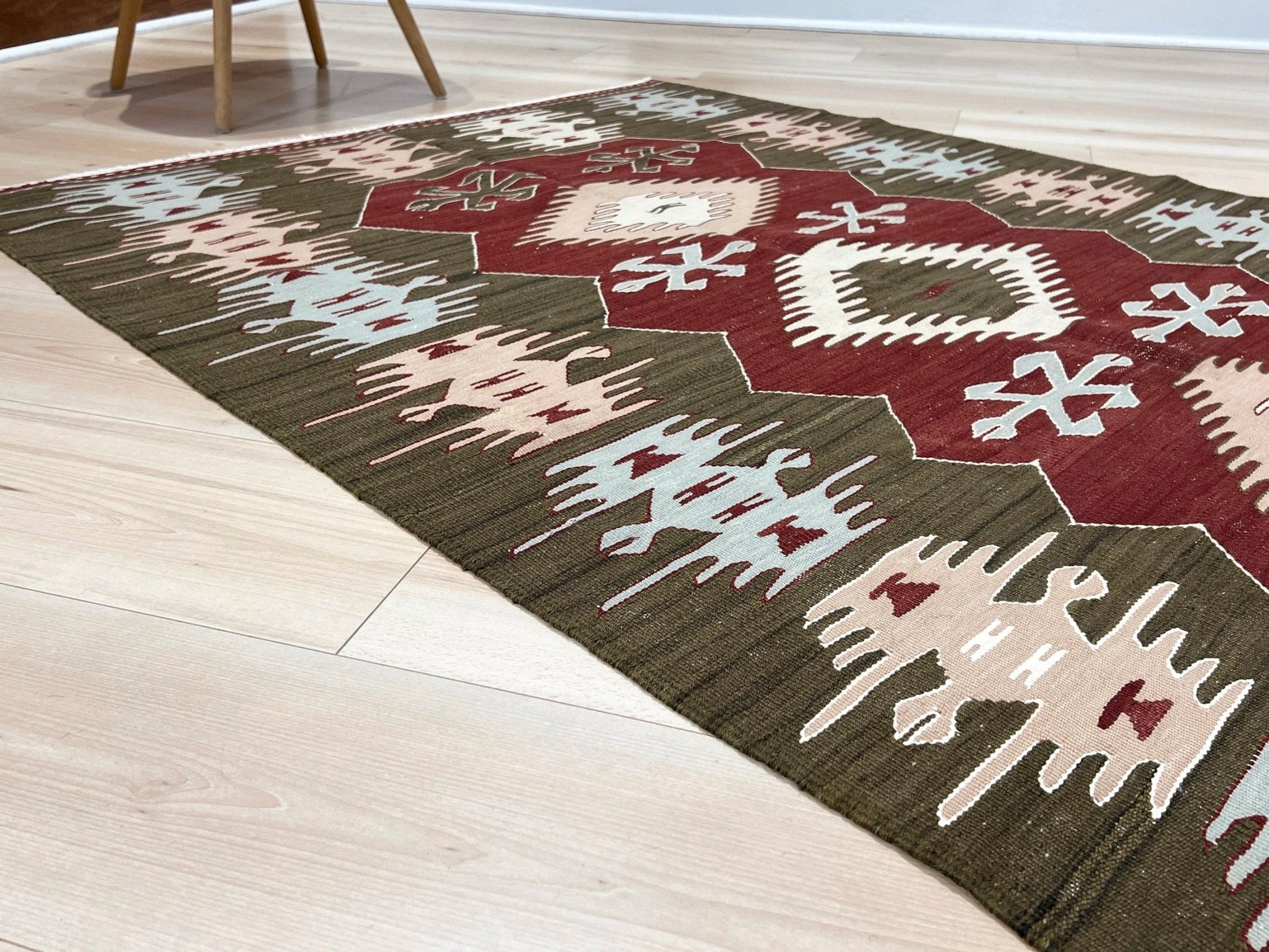 4x6 Vintage Afyon Turkish kilim flatweave rug with maroon field, olive green borders, and tribal scorpion and comb motifs — handmade wool wall hanging, available at Indigo Rugs, the best rug shop in San Francisco Bay Area, Burlingame CA.