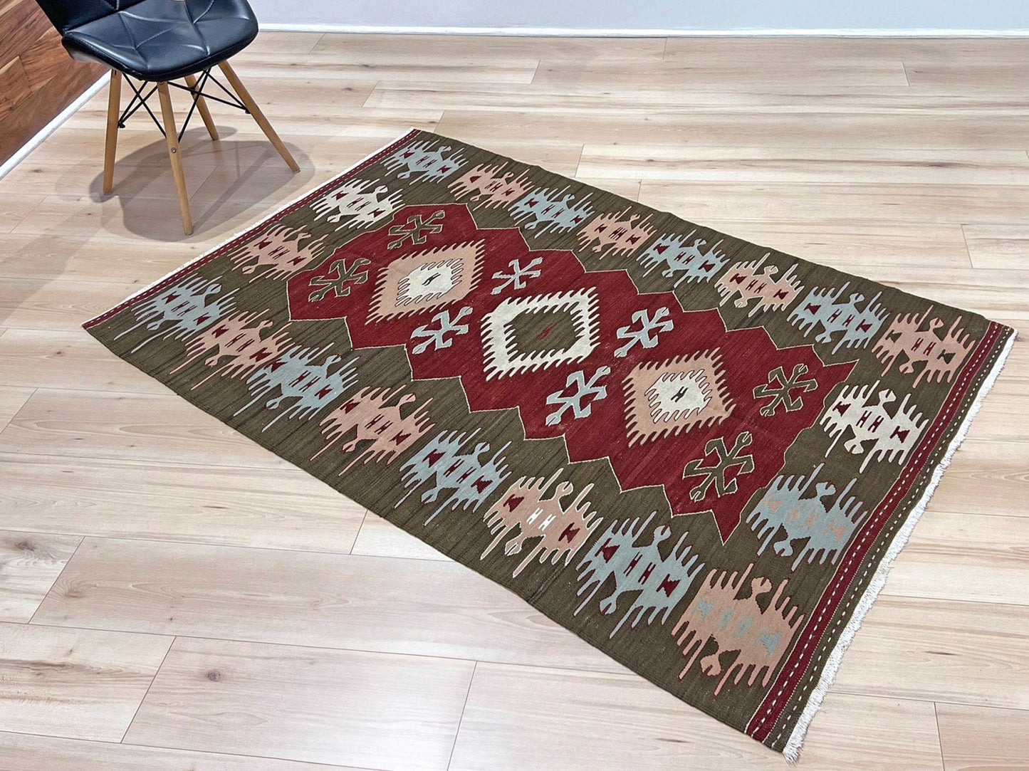 4x6 Vintage Afyon Turkish kilim flatweave rug with maroon field, olive green borders, and tribal scorpion and comb motifs — handmade wool wall hanging, available at Indigo Rugs, the best rug shop in San Francisco Bay Area, Burlingame CA.