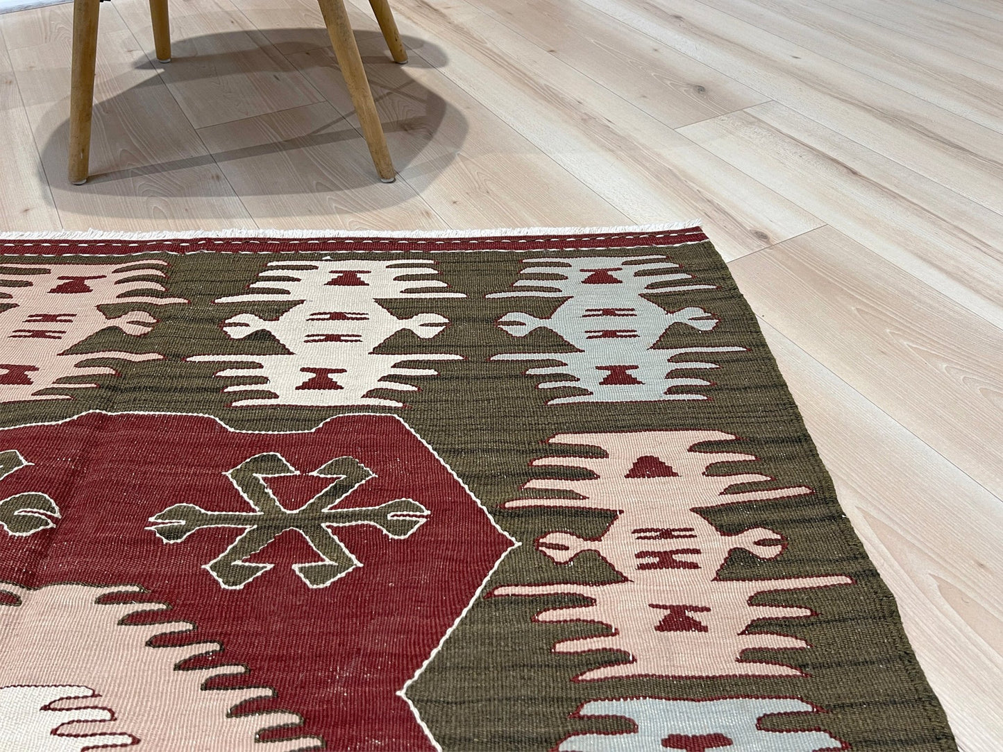 4x6 Vintage Afyon Turkish kilim flatweave rug with maroon field, olive green borders, and tribal scorpion and comb motifs — handmade wool wall hanging, available at Indigo Rugs, the best rug shop in San Francisco Bay Area, Burlingame CA.