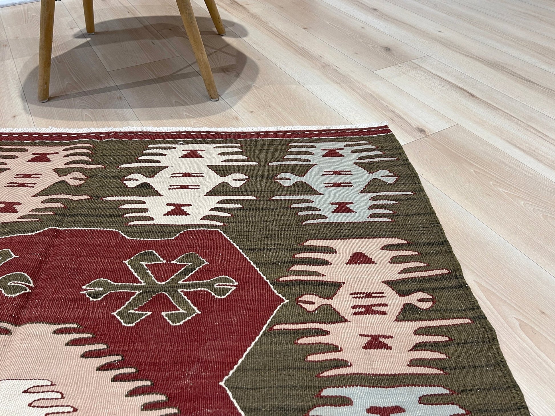 4x6 Vintage Afyon Turkish kilim flatweave rug with maroon field, olive green borders, and tribal scorpion and comb motifs — handmade wool wall hanging, available at Indigo Rugs, the best rug shop in San Francisco Bay Area, Burlingame CA.