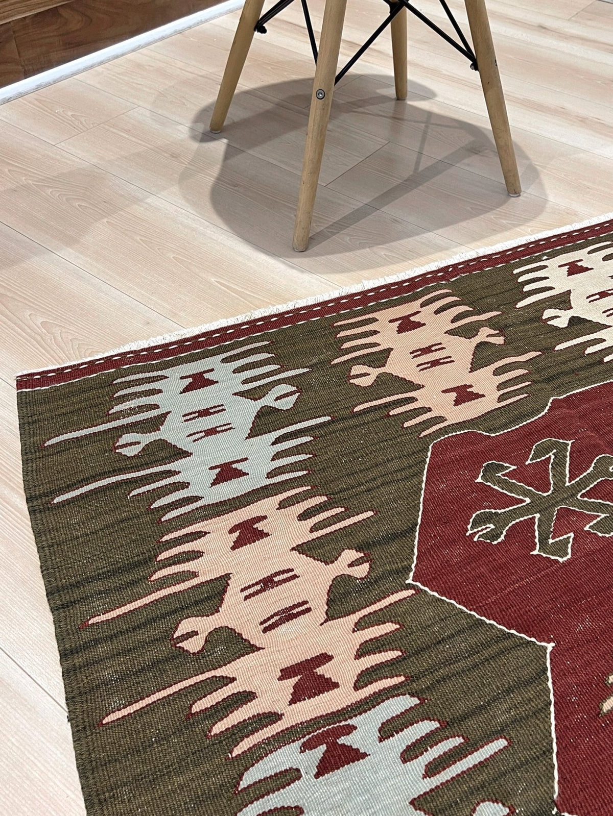 Vintage 4x6 Turkish kilim flatweave rug with maroon field, olive green borders, and tribal motifs — handmade wool wall hanging, available at Indigo Rugs, the best rug shop in San Francisco Bay Area