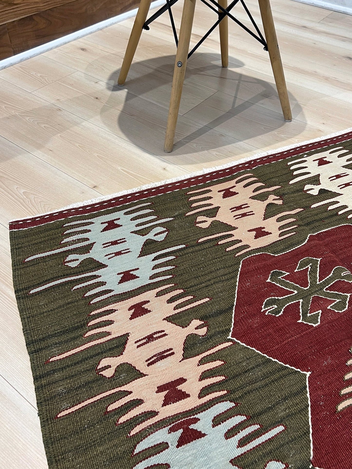 4x6 Vintage Afyon Turkish kilim flatweave rug with maroon field, olive green borders, and tribal scorpion and comb motifs — handmade wool wall hanging, available at Indigo Rugs, the best rug shop in San Francisco Bay Area, Burlingame CA.