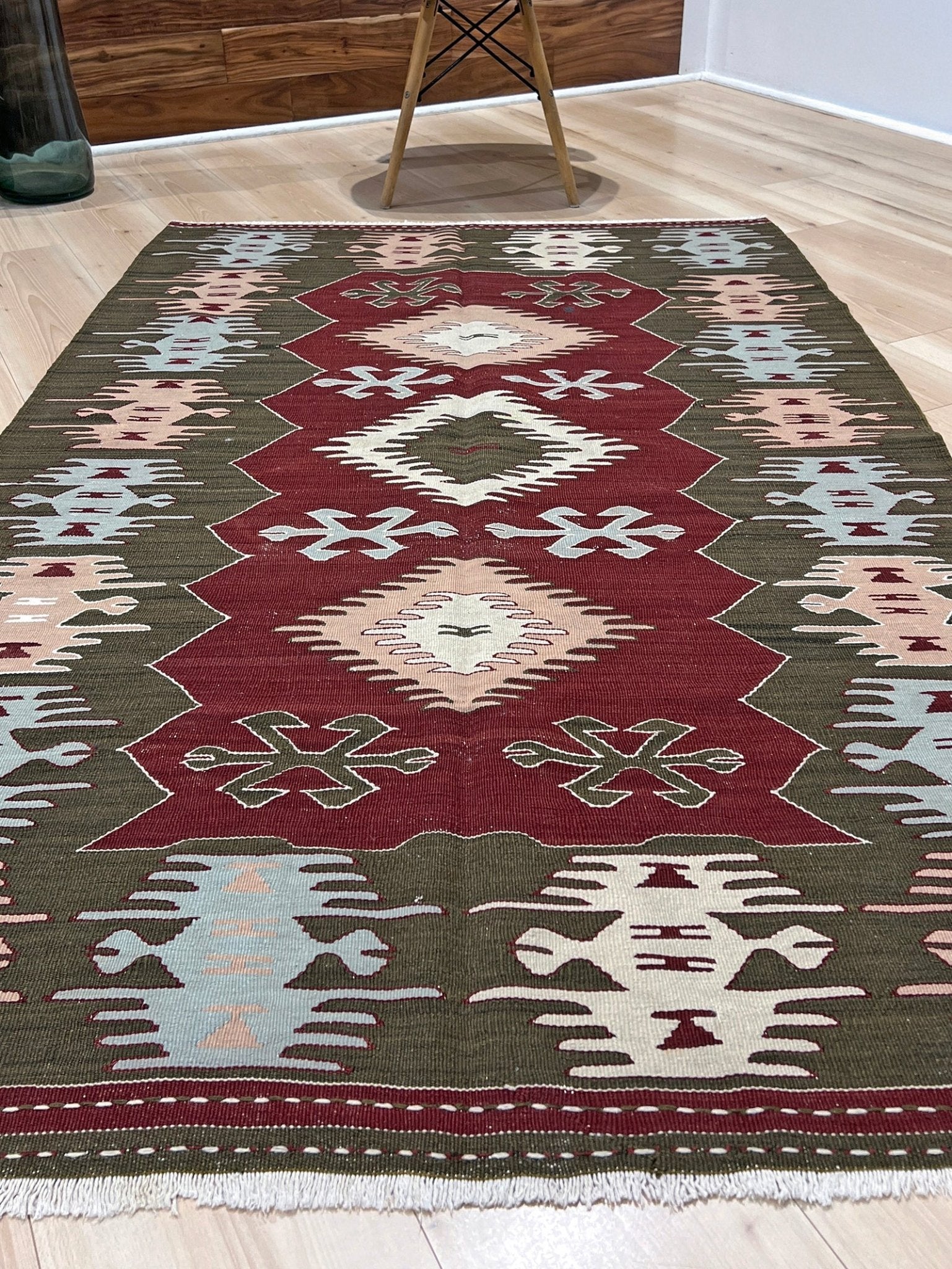 4x6 Vintage Afyon Turkish kilim flatweave rug with maroon field, olive green borders, and tribal scorpion and comb motifs — handmade wool wall hanging, available at Indigo Rugs, the best rug shop in San Francisco Bay Area, Burlingame CA.