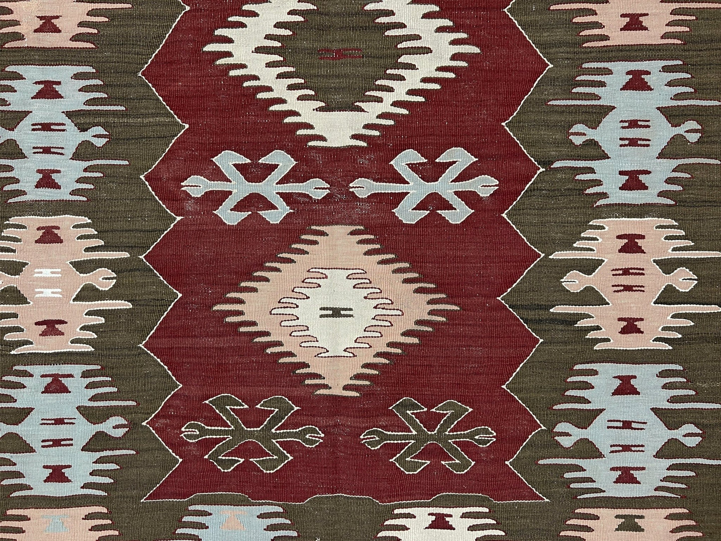 4x6 Vintage Afyon Turkish kilim flatweave rug with maroon field, olive green borders, and tribal scorpion and comb motifs — handmade wool wall hanging, available at Indigo Rugs, the best rug shop in San Francisco Bay Area, Burlingame CA.