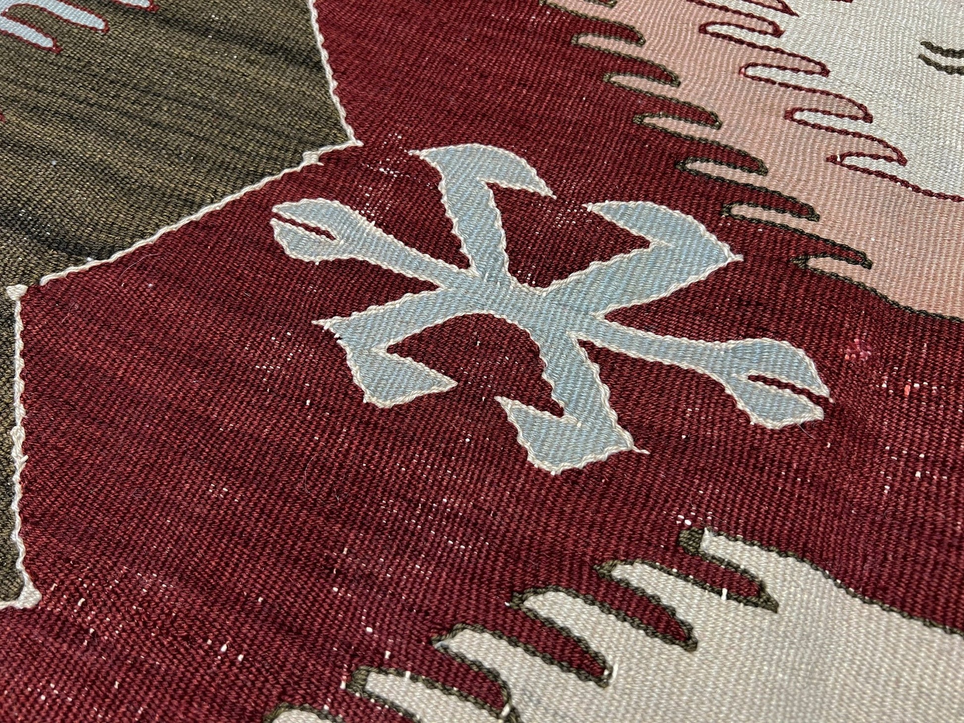 4x6 Vintage Afyon Turkish kilim flatweave rug with maroon field, olive green borders, and tribal scorpion and comb motifs — handmade wool wall hanging, available at Indigo Rugs, the best rug shop in San Francisco Bay Area, Burlingame CA.