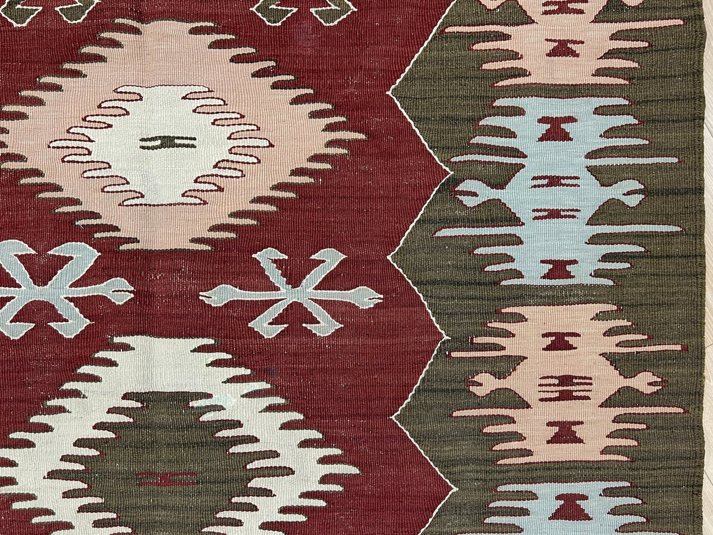 4x6 Vintage Afyon Turkish kilim flatweave rug with maroon field, olive green borders, and tribal scorpion and comb motifs — handmade wool wall hanging, available at Indigo Rugs, the best rug shop in San Francisco Bay Area, Burlingame CA.
