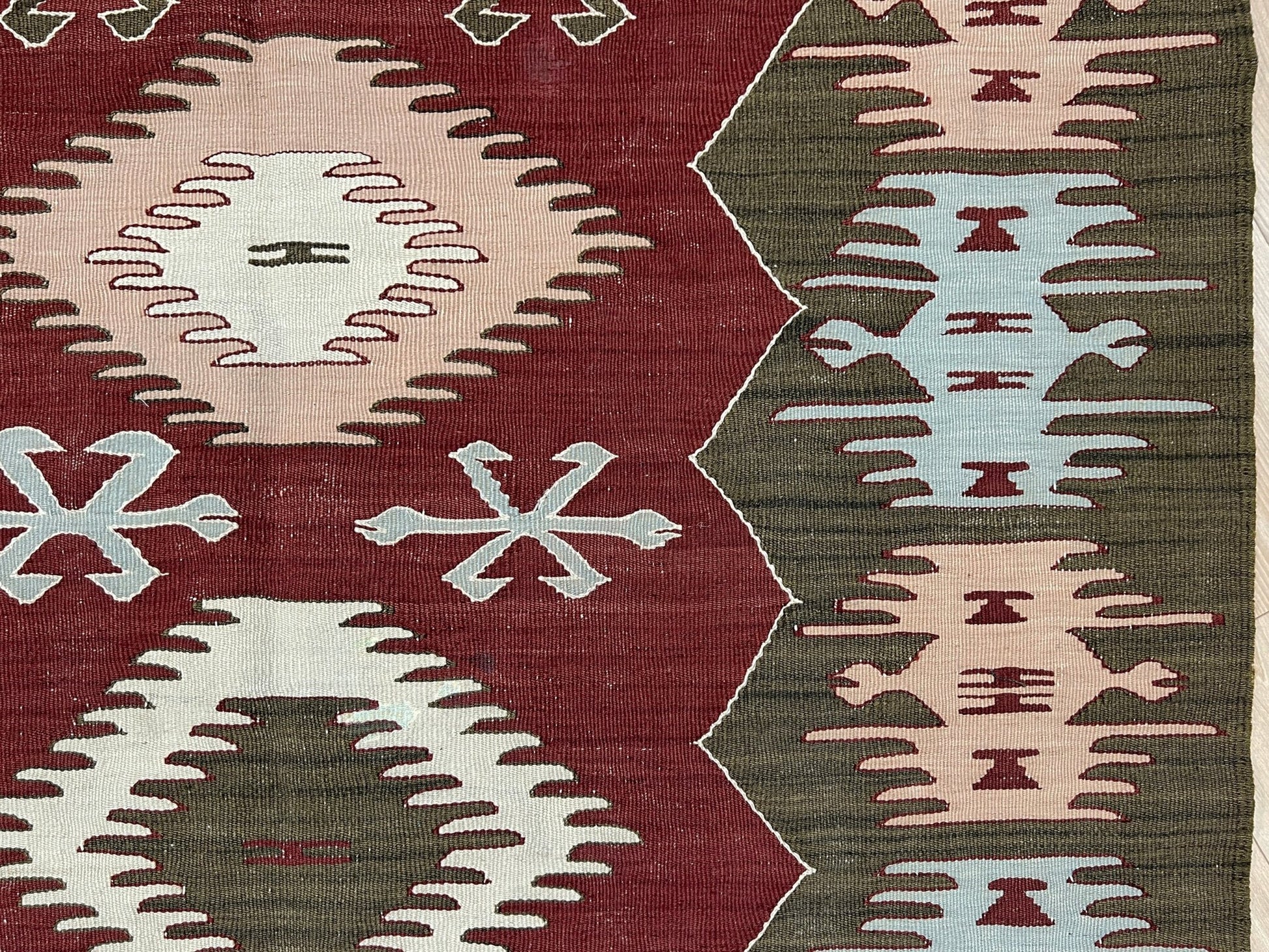 4x6 Vintage Afyon Turkish kilim flatweave rug with maroon field, olive green borders, and tribal scorpion and comb motifs — handmade wool wall hanging, available at Indigo Rugs, the best rug shop in San Francisco Bay Area, Burlingame CA.
