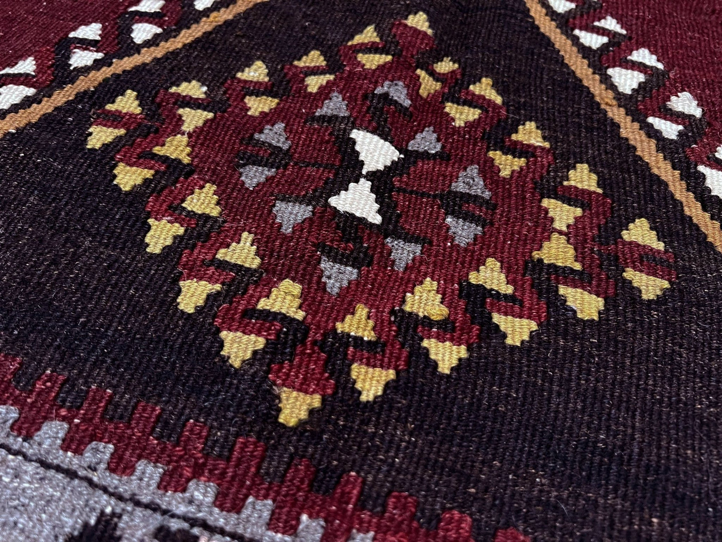 vintage kayseri turkish kilim rug 5x8 burgundy plum geometric flatweave central anatolia handmade wool rug san francisco bay area rug shop indigo rugs
