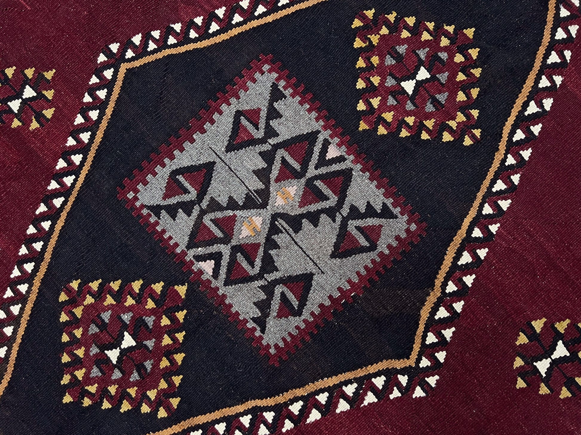vintage kayseri turkish kilim rug 5x8 burgundy plum geometric flatweave central anatolia handmade wool rug san francisco bay area rug shop indigo rugs
