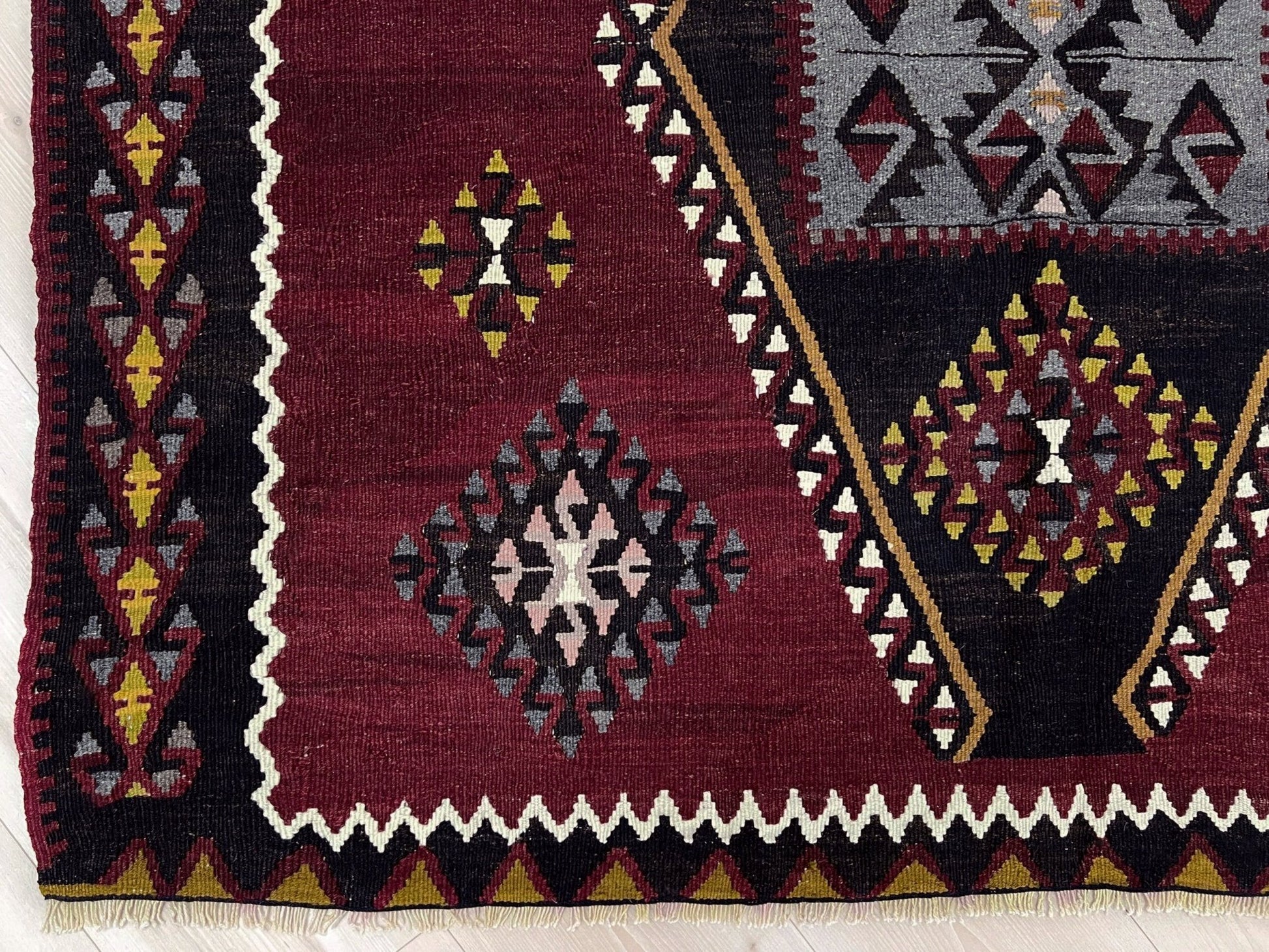 vintage kayseri turkish kilim rug 5x8 burgundy plum geometric flatweave central anatolia handmade wool rug san francisco bay area rug shop indigo rugs
