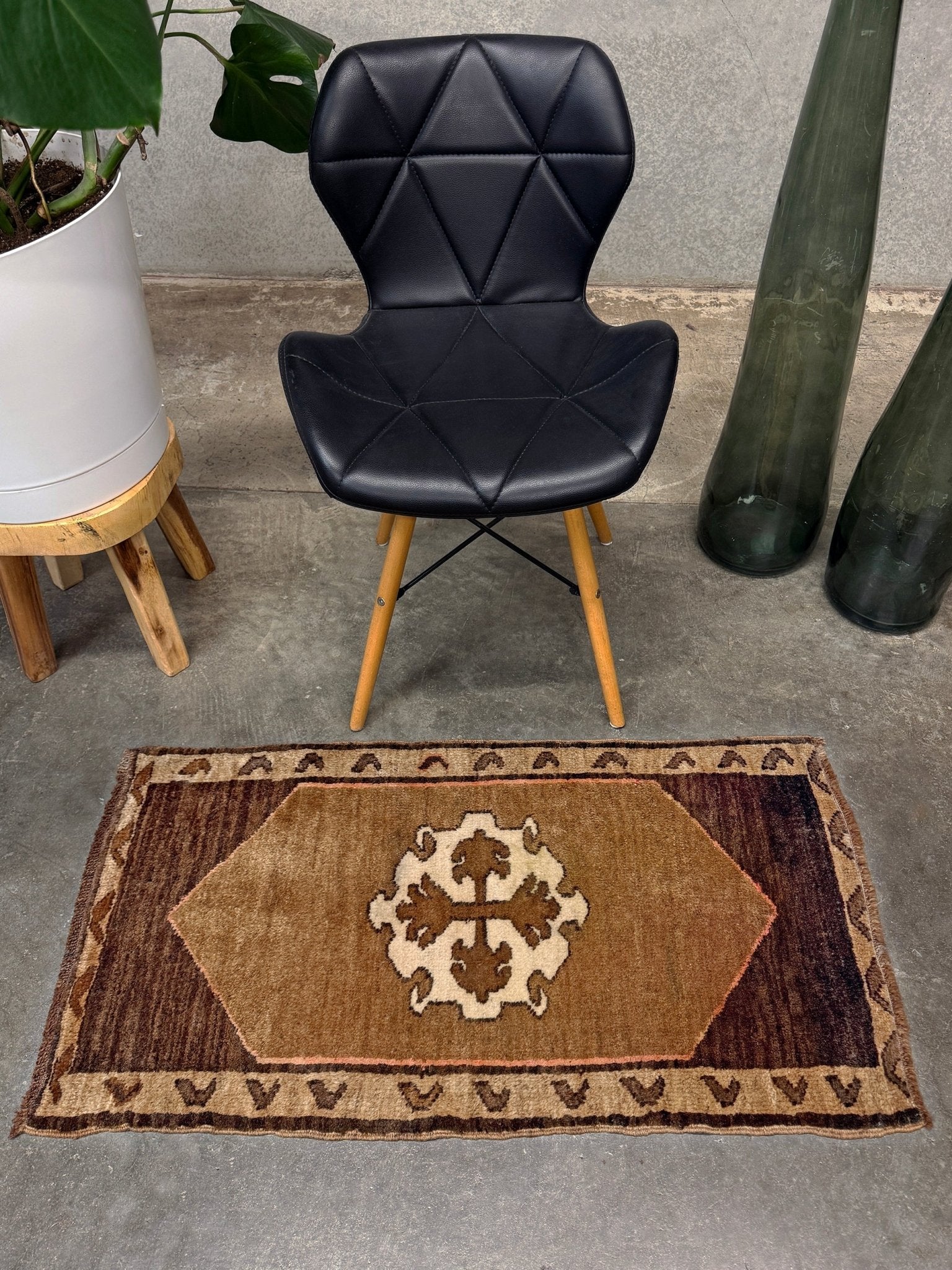 Decorative neutral vintage Turkish mini rug yastik 2x3 made from undyed handspun sheep wool, featuring natural brown and ivory tones with a subtle red accent, geometric medallion design. From Indigo Rugs, Burlingame — the best rug shop in the San Francisco Bay Area. Free shipping.