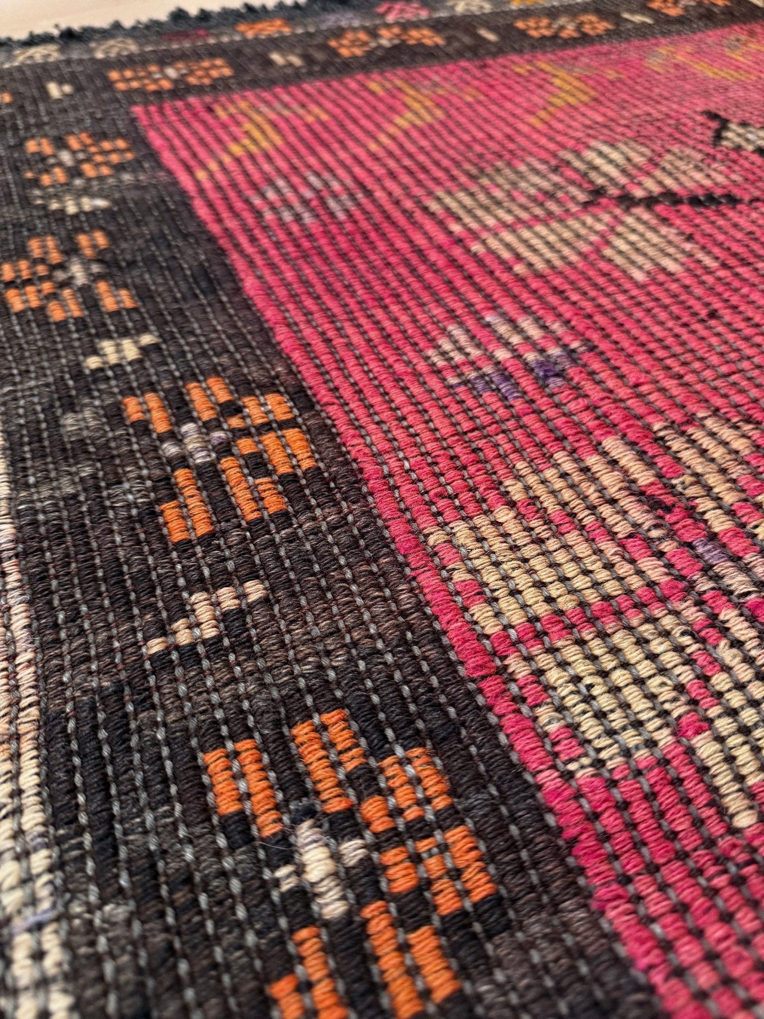 3x4 Vintage Malatya Zile kilim rug with warm pink field and vase floral design — handwoven wool flatweave fug for entryway, bedroom, bathroom, wall art Turkey, available at Indigo Rugs, Burlingame CA.