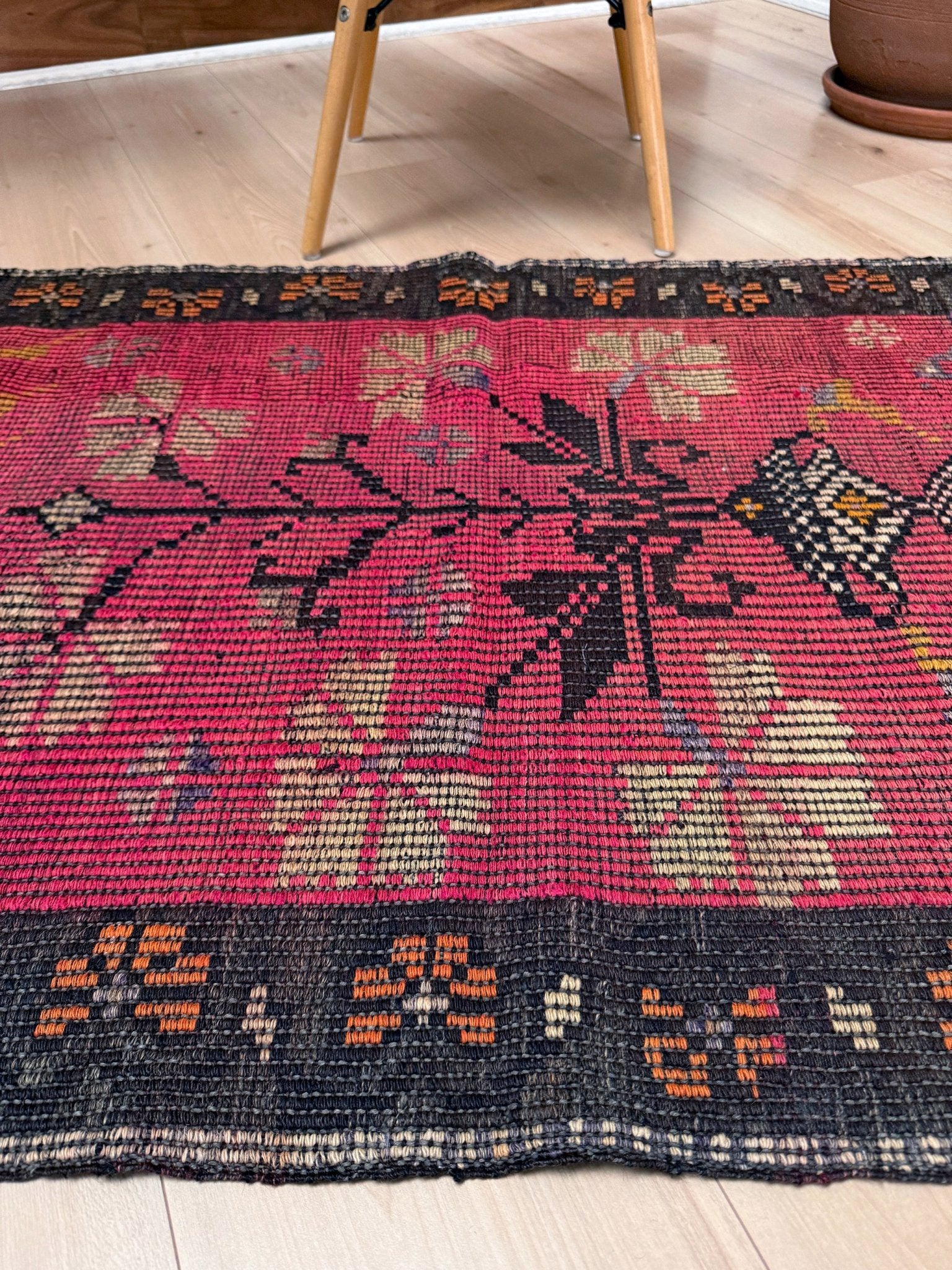 3x4 Vintage Malatya Zili kilim rug with warm pink field and vase floral design — handwoven wool flatweave fug for entryway, bedroom, bathroom, wall art Turkey, available at Indigo Rugs, Burlingame CA.