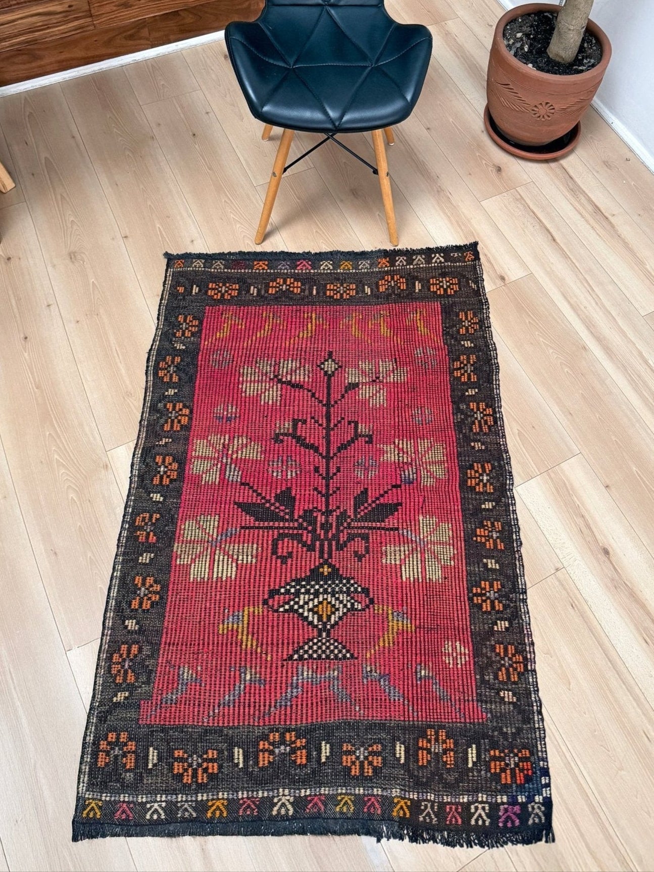 3x4 Vintage Malatya Zile kilim rug with warm pink field and vase floral design — handwoven wool flatweave fug for entryway, bedroom, bathroom, wall art Turkey, available at Indigo Rugs, Burlingame CA.