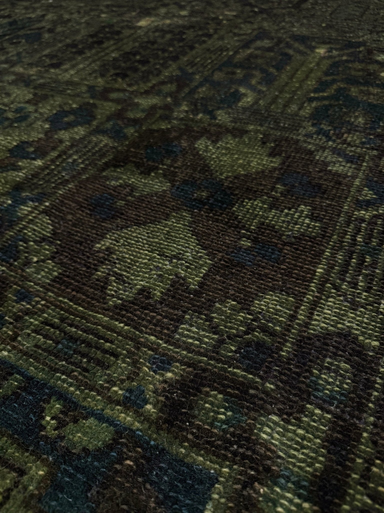 9x12 handmade overdyed Persian Bakhtiari vintage rug in deep moss green with distressed garden panel design — shown at Indigo Rugs, Burlingame — San Francisco Bay Area with free shipping