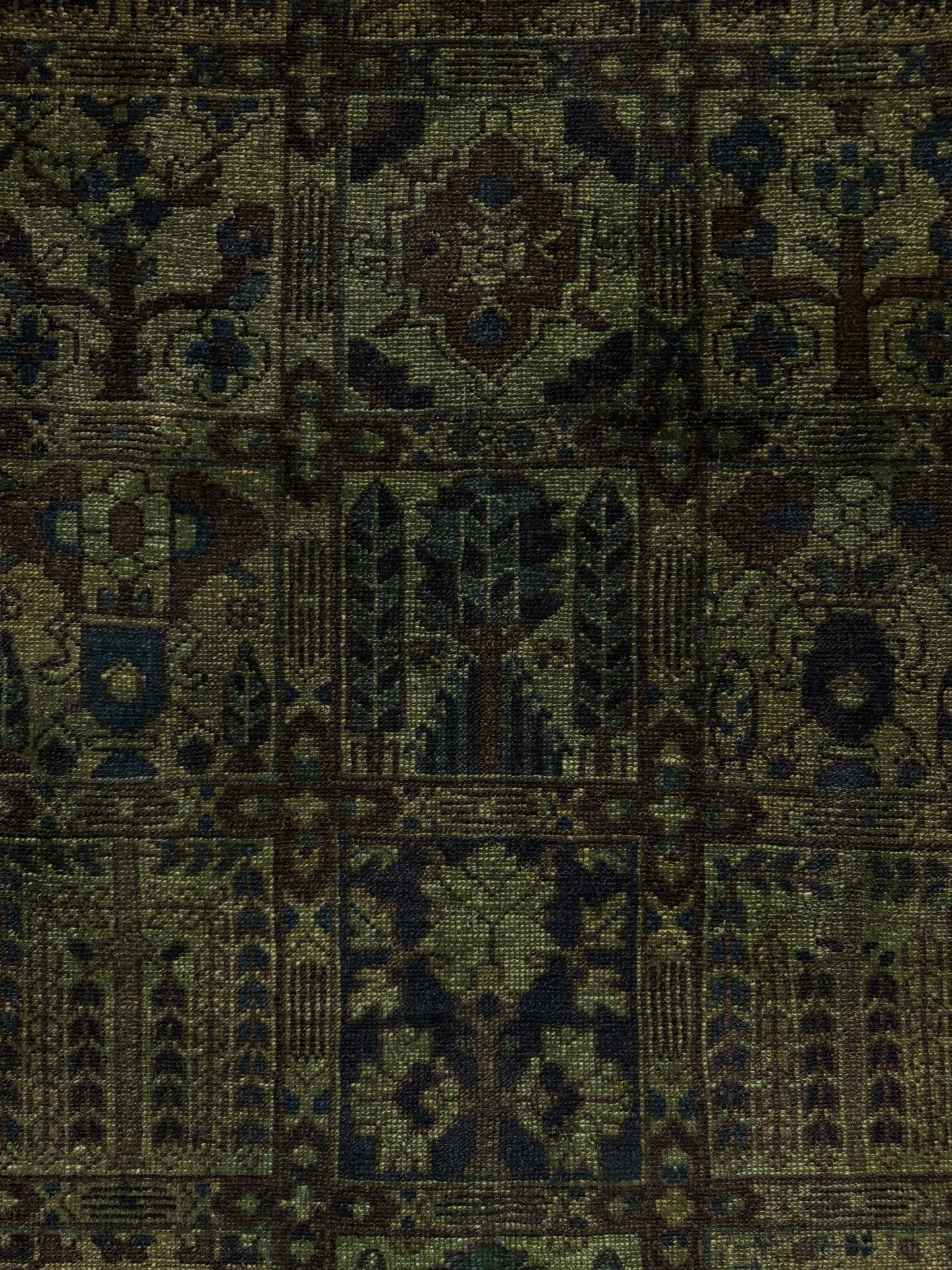 9x12 handmade overdyed Persian Bakhtiari vintage rug in deep moss green with distressed garden panel design — shown at Indigo Rugs, Burlingame — San Francisco Bay Area with free shipping