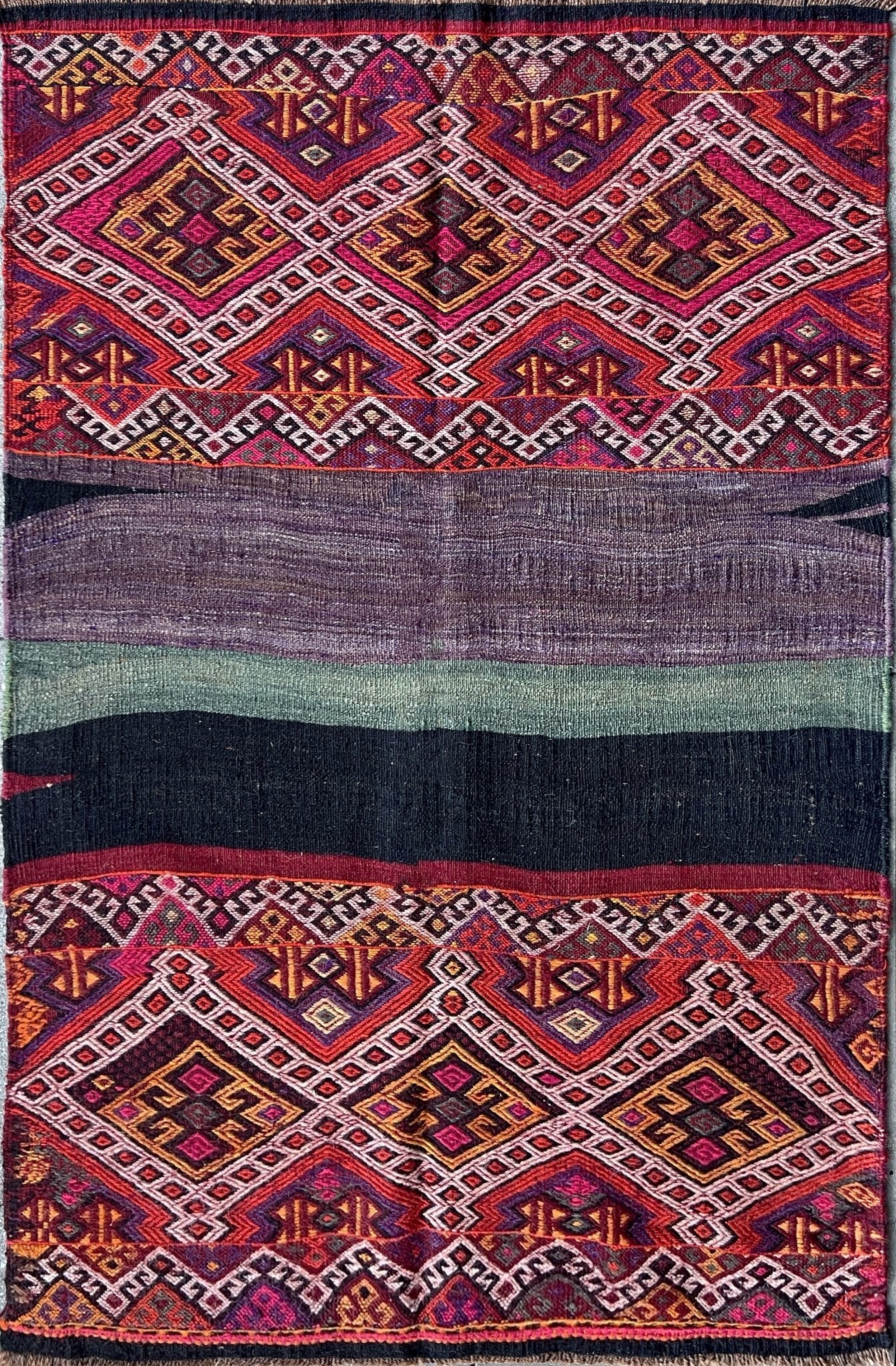 4x6 Small Kurdish Kilim Scatter accent rug from Turkey in Cicim embroidery technique, featuring bold geometric patterns in red, purple, pink and earthy tones. Offered by the best Kilim rug store in the San Francisco Bay Area, with free shipping to the US and Canada. A perfect gift idea for this season.