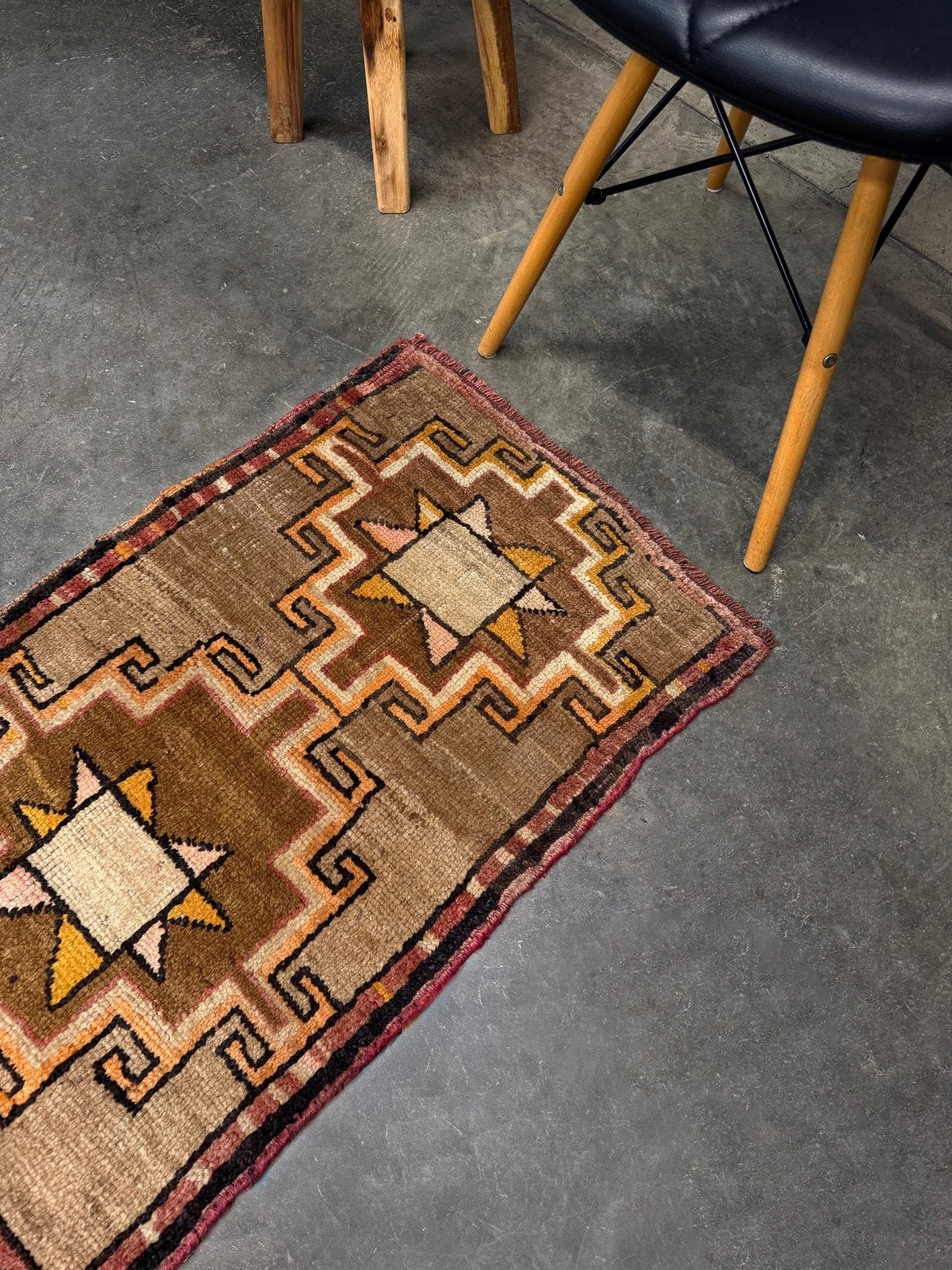 Earthy Vintage Turkish mini rug village rug with warm camel-beige field, stepped geometric star motifs, handmade wool rug measuring approximately 21 x 33 inches. From the best rug shop in SF Bay Area Burlingaöe CA. Free Shipping.