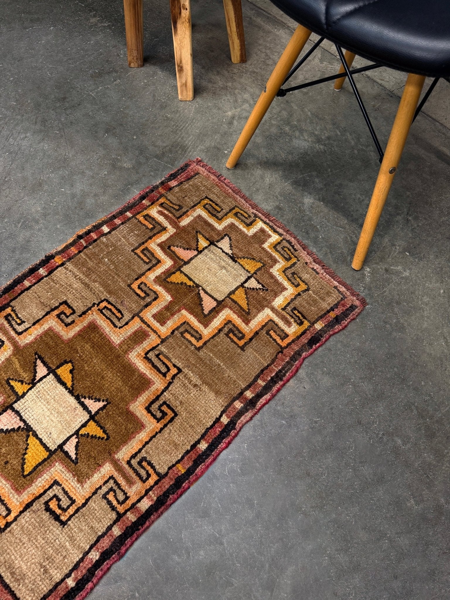 Earthy Vintage Turkish mini rug village rug with warm camel-beige field, stepped geometric star motifs, handmade wool rug measuring approximately 21 x 33 inches. From the best rug shop in SF Bay Area Burlingaöe CA. Free Shipping.