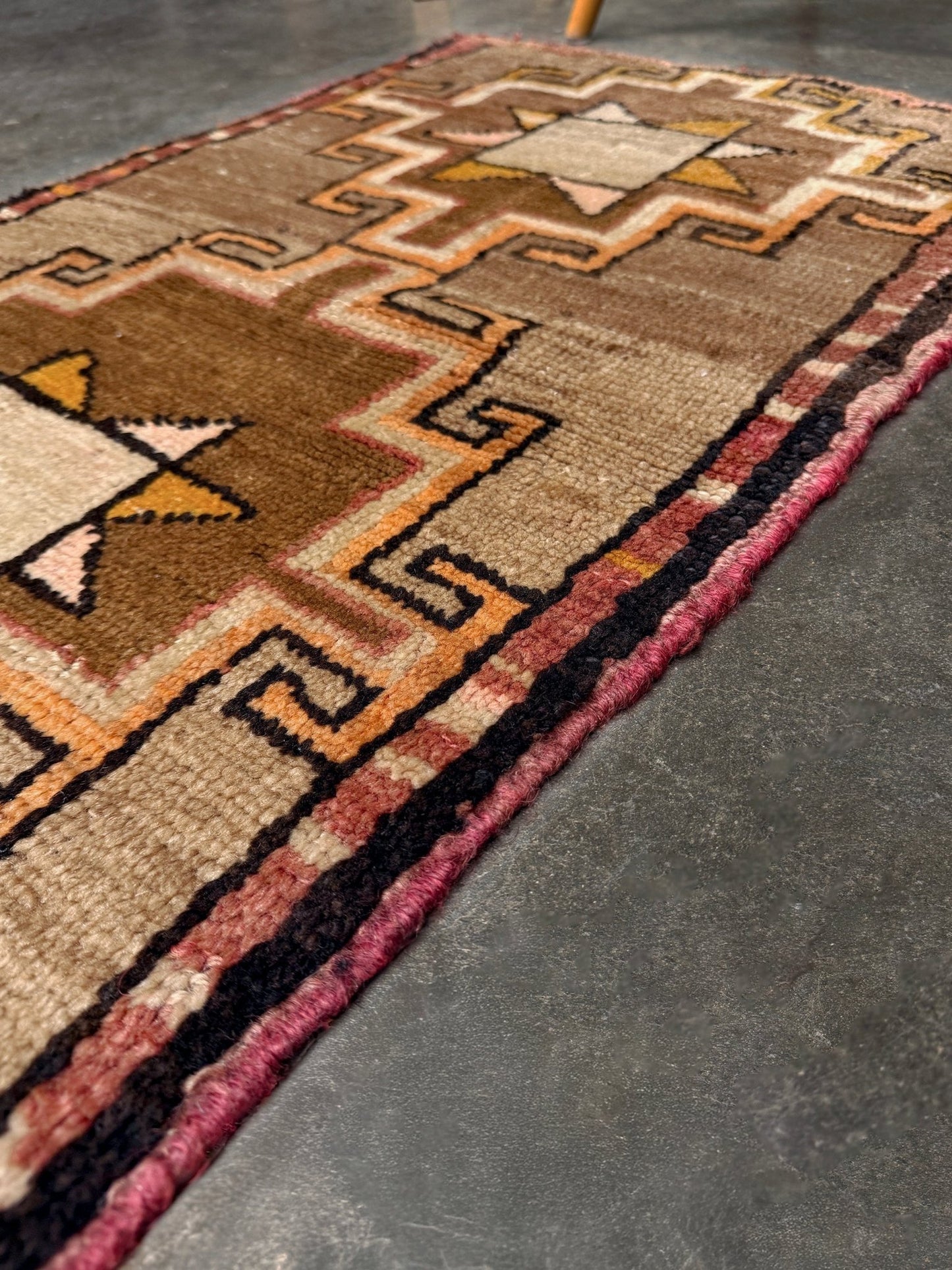 Earthy Vintage Turkish mini rug village rug with warm camel-beige field, stepped geometric star motifs, handmade wool rug measuring approximately 21 x 33 inches. From the best rug shop in SF Bay Area Burlingaöe CA. Free Shipping.