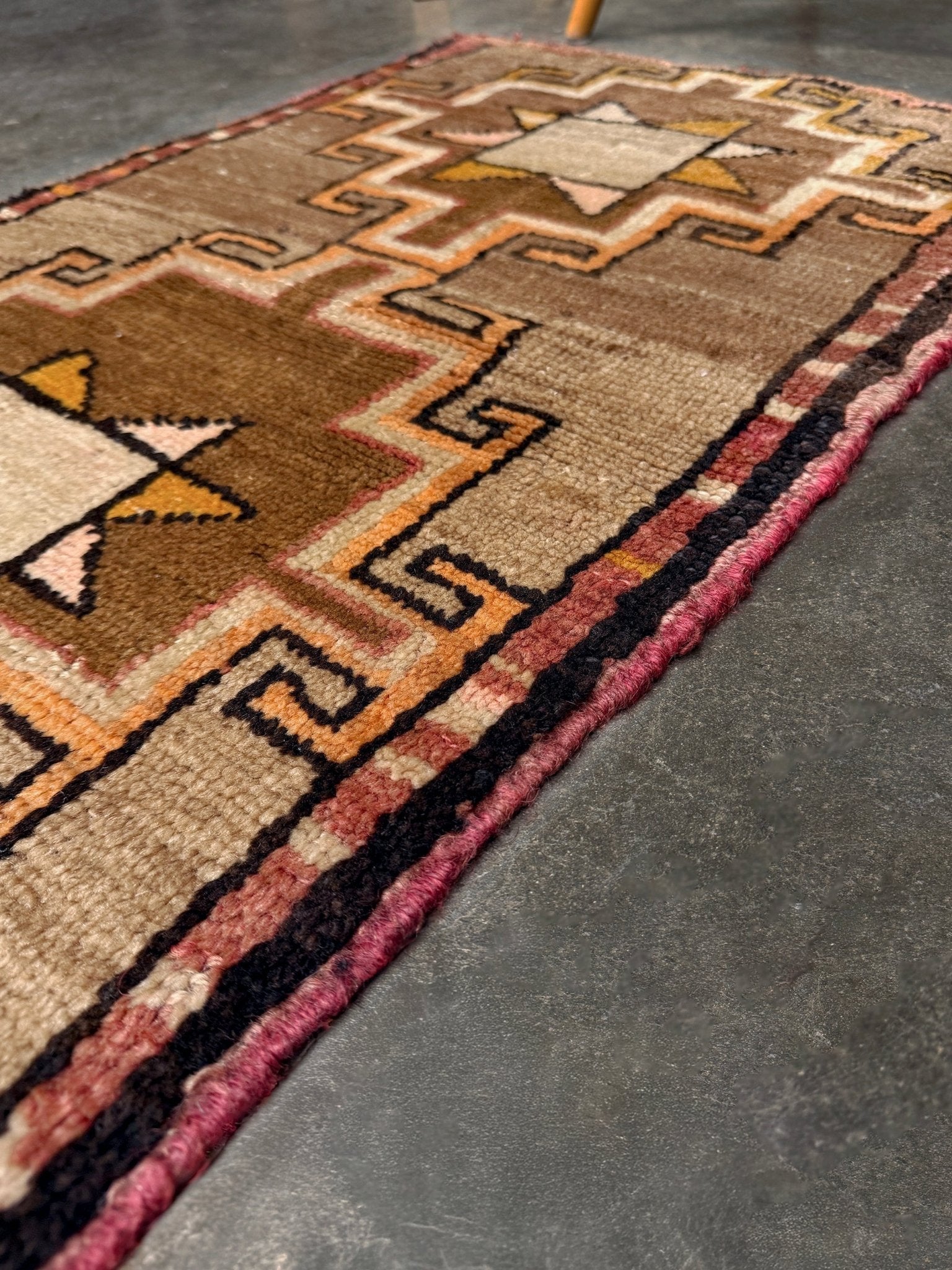 Earthy Vintage Turkish mini rug village rug with warm camel-beige field, stepped geometric star motifs, handmade wool rug measuring approximately 21 x 33 inches. From the best rug shop in SF Bay Area Burlingaöe CA. Free Shipping.