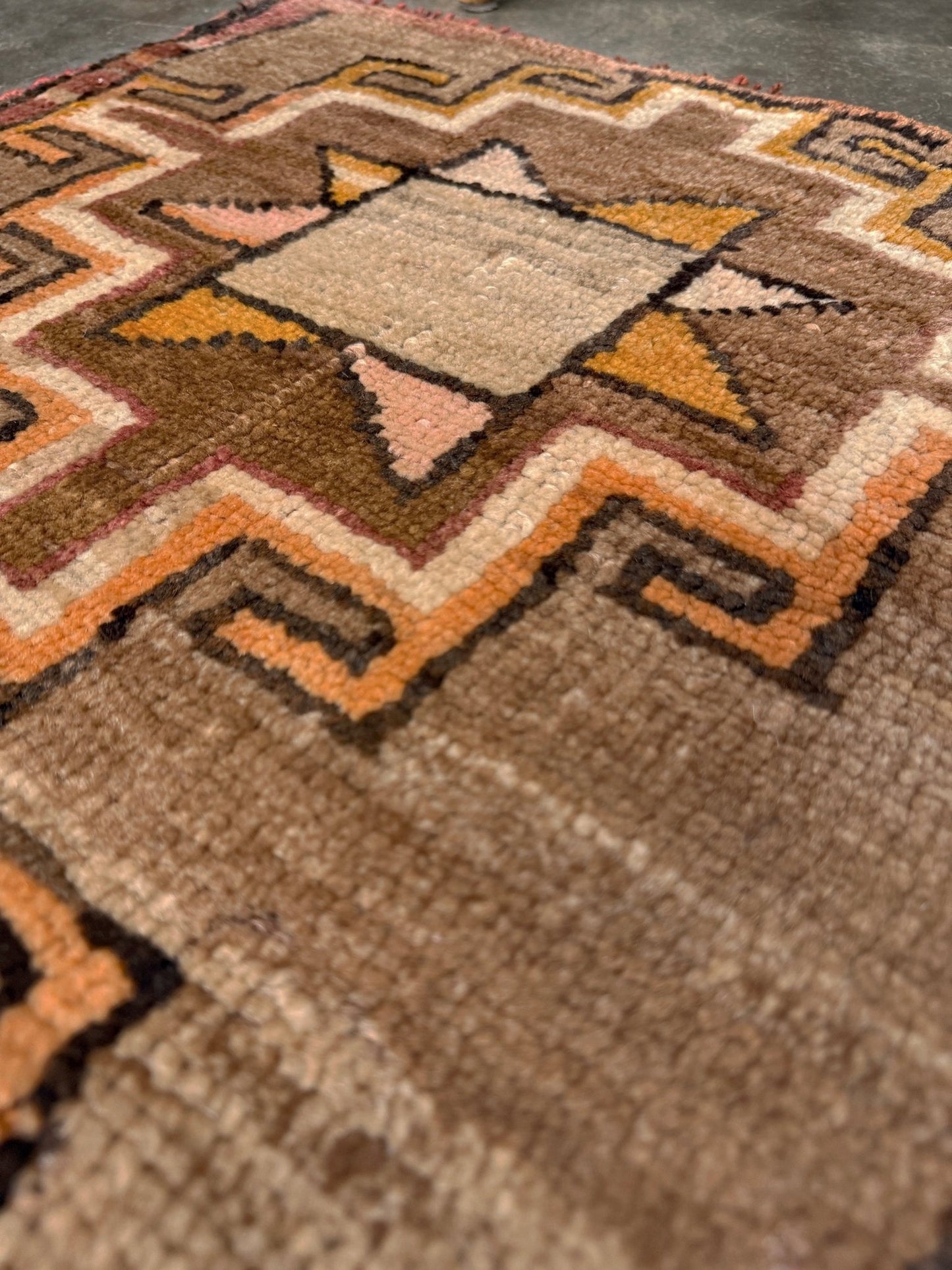 Earthy Vintage Turkish mini rug village rug with warm camel-beige field, stepped geometric star motifs, handmade wool rug measuring approximately 21 x 33 inches. From the best rug shop in SF Bay Area Burlingaöe CA. Free Shipping.