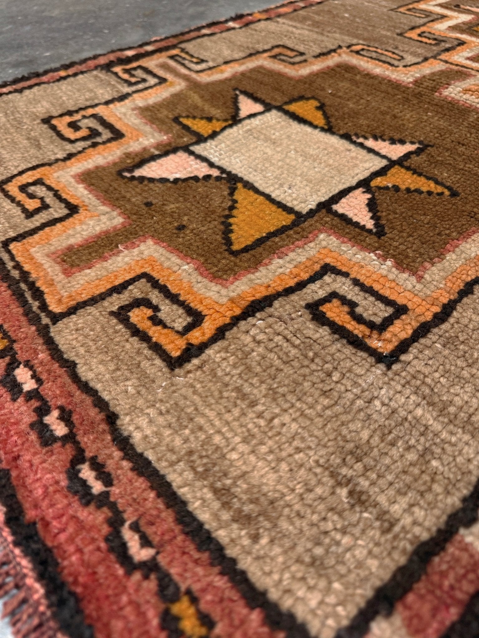 Earthy Vintage Turkish mini rug village rug with warm camel-beige field, stepped geometric star motifs, handmade wool rug measuring approximately 21 x 33 inches. From the best rug shop in SF Bay Area Burlingaöe CA. Free Shipping.