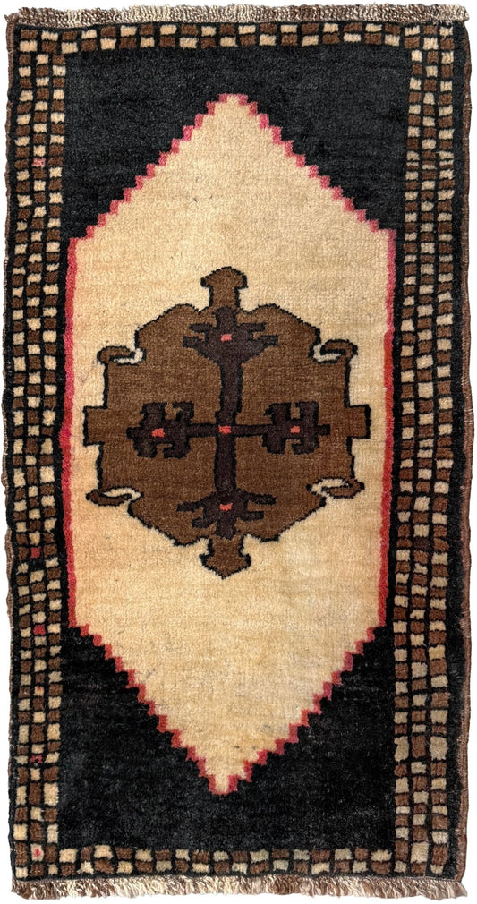 Neurtal Vintage Turkish mini rug 2x3, perfect for entryways, bedside, or layered décor. with a soft ivory field and bold geometric medallion in warm brown tones, framed by a deep cocoa-brown border with subtle brick-red accents. Handmade Anatolian wool rug,  From Indigo Rugs, Burlingame, San Francisco Bay Area.