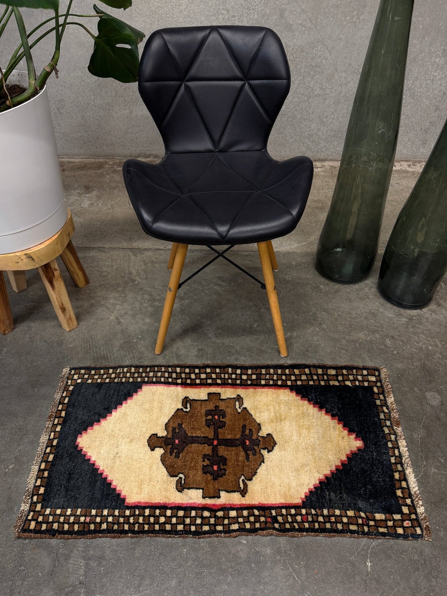 Neurtal Vintage Turkish mini rug 2x3, perfect for entryways, bedside, or layered décor. with a soft ivory field and bold geometric medallion in warm brown tones, framed by a deep cocoa-brown border with subtle brick-red accents. Handmade Anatolian wool rug,  From Indigo Rugs, Burlingame, San Francisco Bay Area.