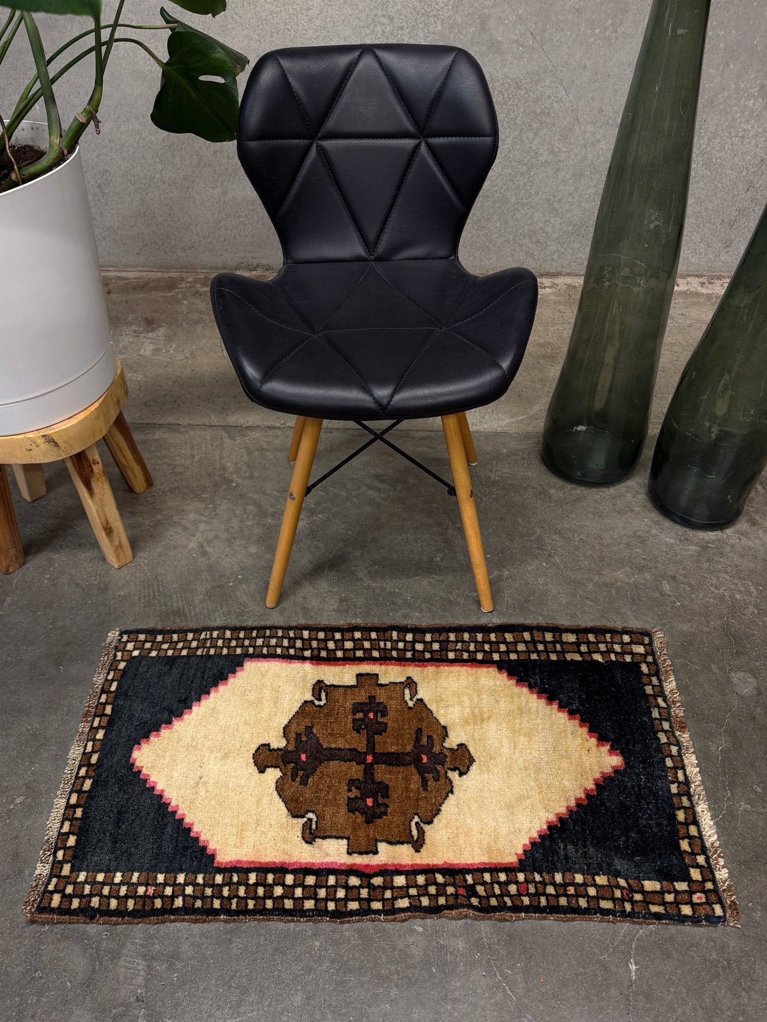 Neurtal Vintage Turkish mini rug 2x3, perfect for entryways, bedside, or layered décor. with a soft ivory field and bold geometric medallion in warm brown tones, framed by a deep cocoa-brown border with subtle brick-red accents. Handmade Anatolian wool rug,  From Indigo Rugs, Burlingame, San Francisco Bay Area.