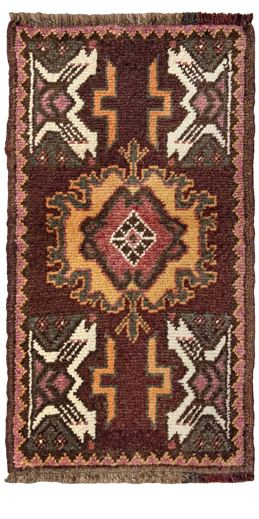 19x38 handmade Turkish vintage mini rug with maroon field, tribal medallion, saffron gold and dusty rose motifs — shown styled as a small accent rug at Indigo Rugs, Burlingame San Francisco Bay Area with free shipping