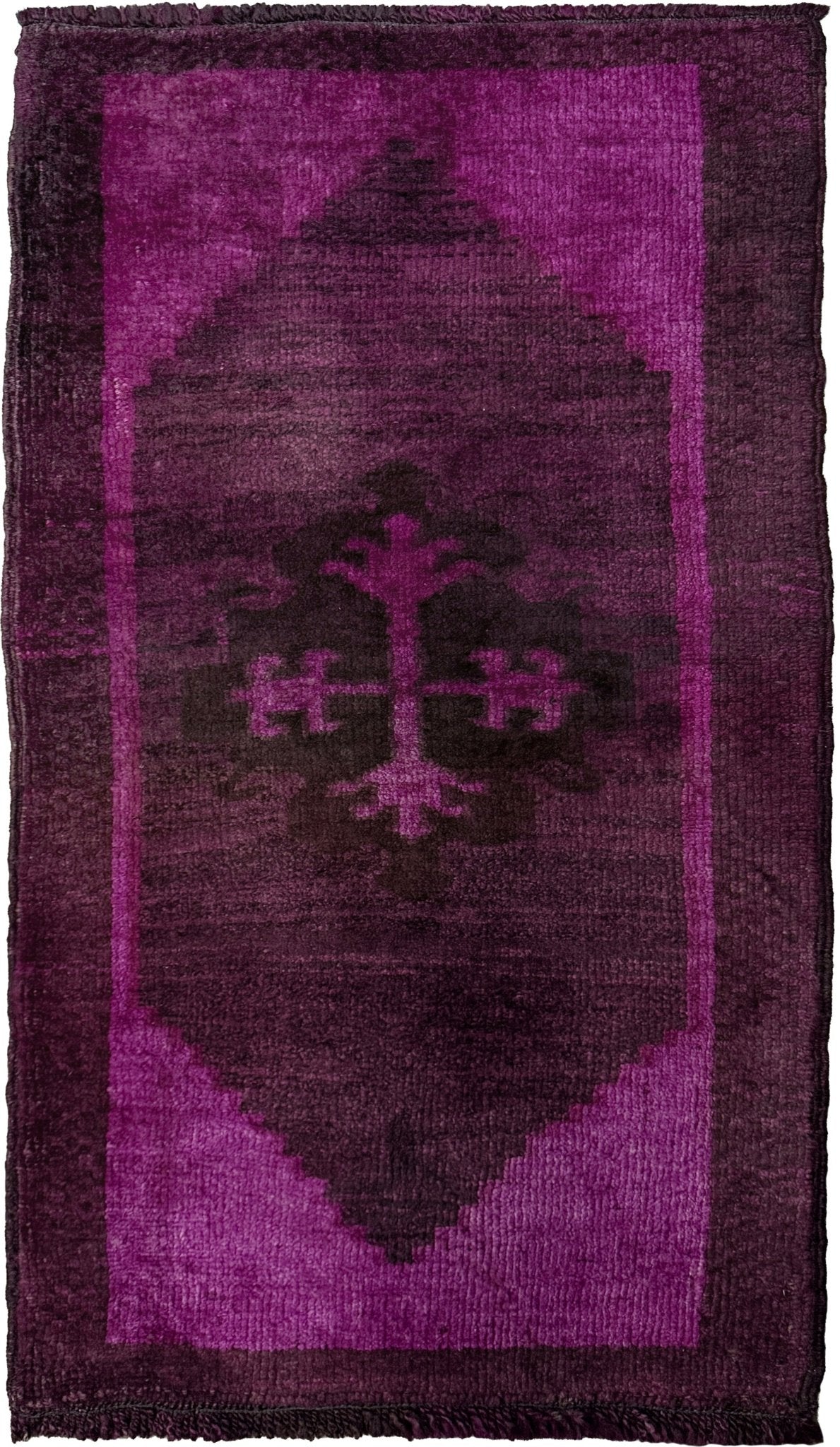 Magenta Purple Turkish mini rug with deep plum purple field, aubergine and blackberry shading, soft magenta border glow, and subtle geometric medallion. Handmade wool rug measuring 18 × 38 inches, perfect for entryways, kitchens, bedside spaces, or layered interiors.