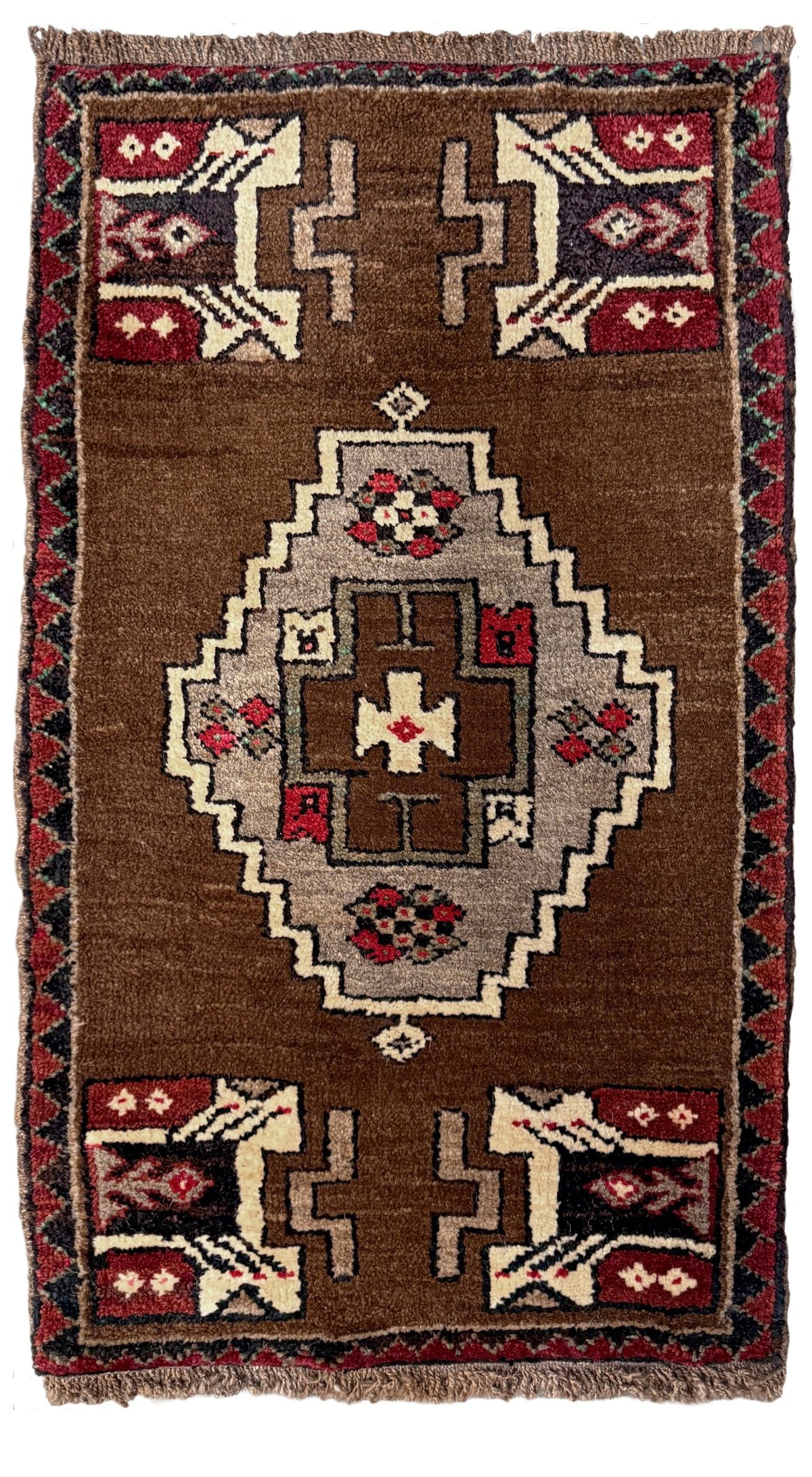 Vintage Turkish Yastik mini rug in walnut brown with taupe and camel medallion Hand-knotted wool, 2x3. One-of-a-kind rug from Indigo Rugs, the best rug shop in the San Francisco Bay Area 