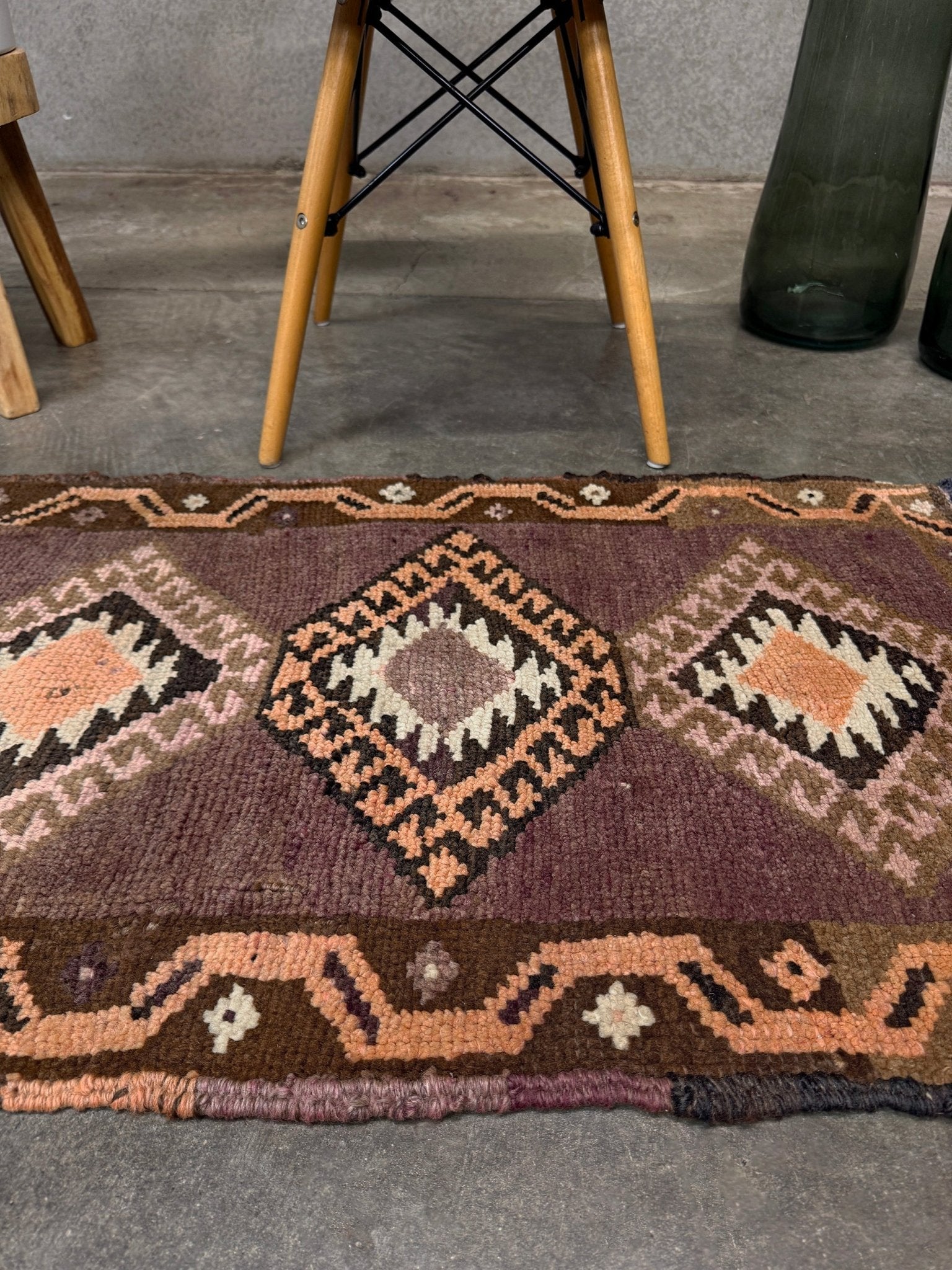 Earthy mauve and brown vintage Turkish mini rug with stacked diamond medallions in peach and ivory, handmade Anatolian Yastik rug 2x3, perfect for entryway or bedside accent, kitchen.