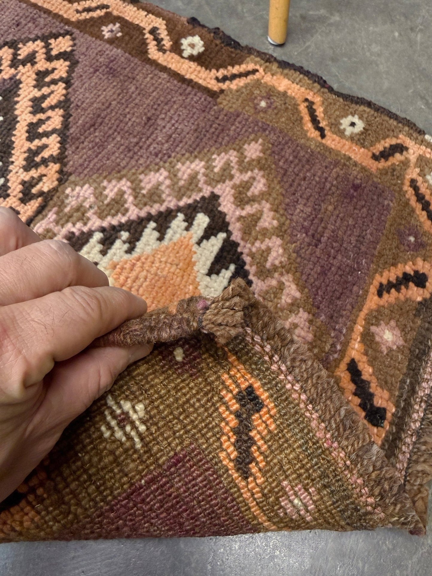 Earthy mauve and brown vintage Turkish mini rug with stacked diamond medallions in peach and ivory, handmade Anatolian Yastik rug 2x3, perfect for entryway or bedside accent, kitchen.
